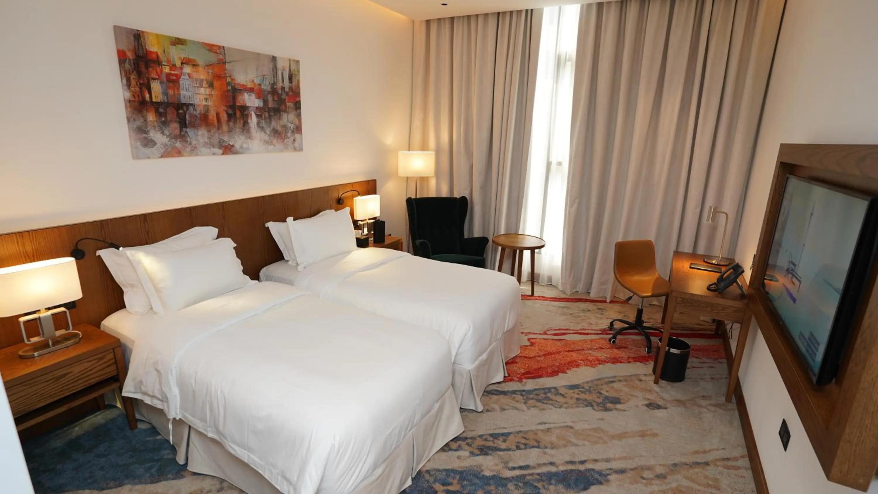 Bed in Jasmine Garden Hotel