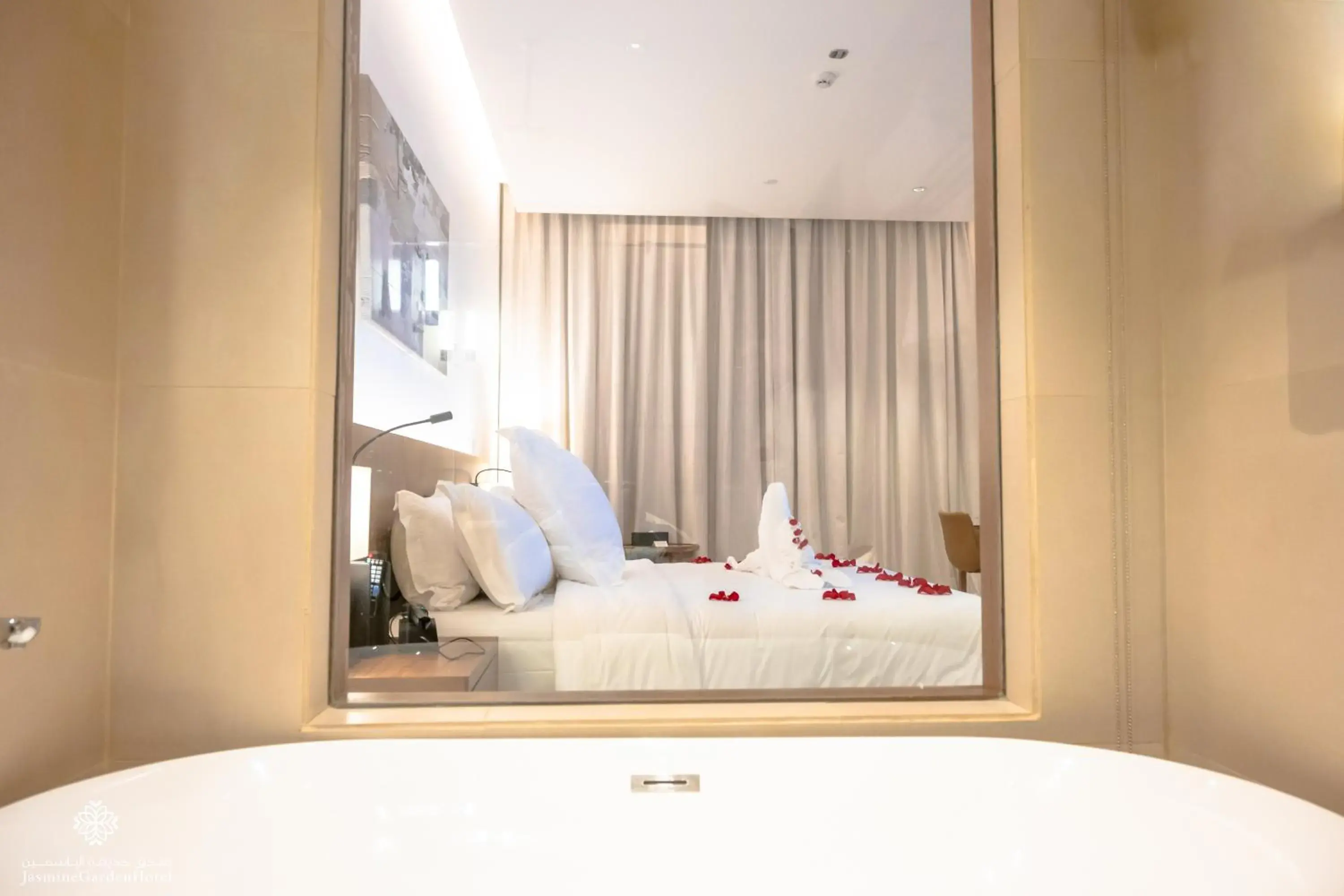 Bed in Jasmine Garden Hotel Bed in Jasmine Garden Hotel