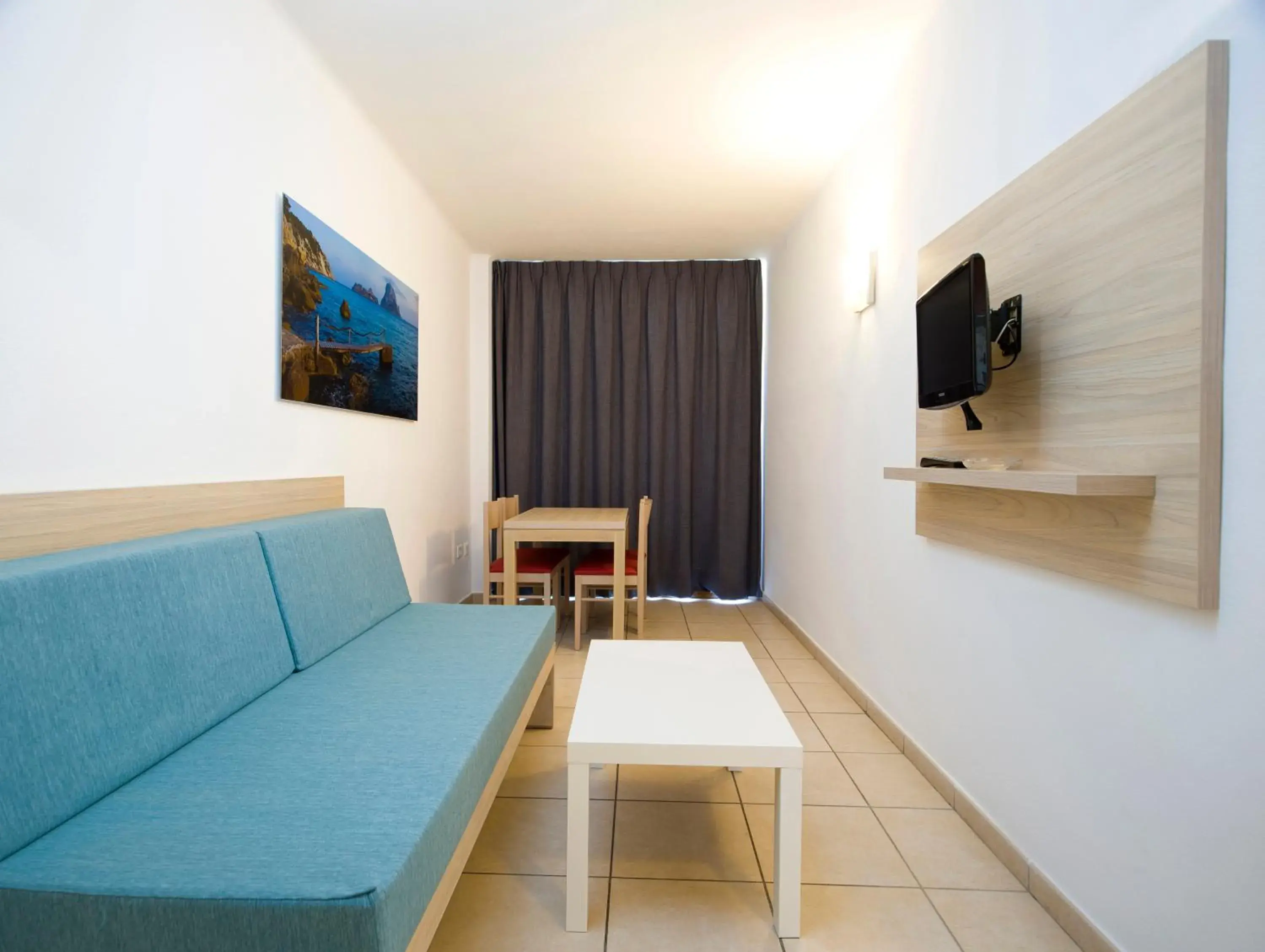 Living room in Apartamentos Tramuntana Living room in Apartamentos Tramuntana