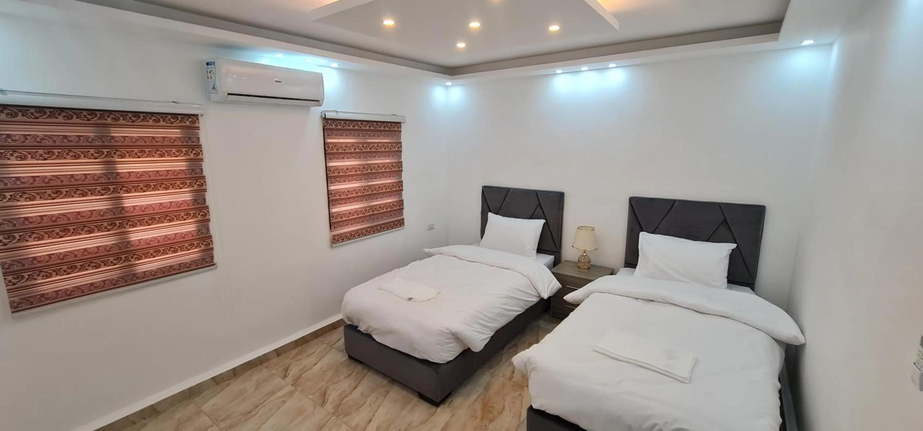 Bed in Nabateans Home Hotel