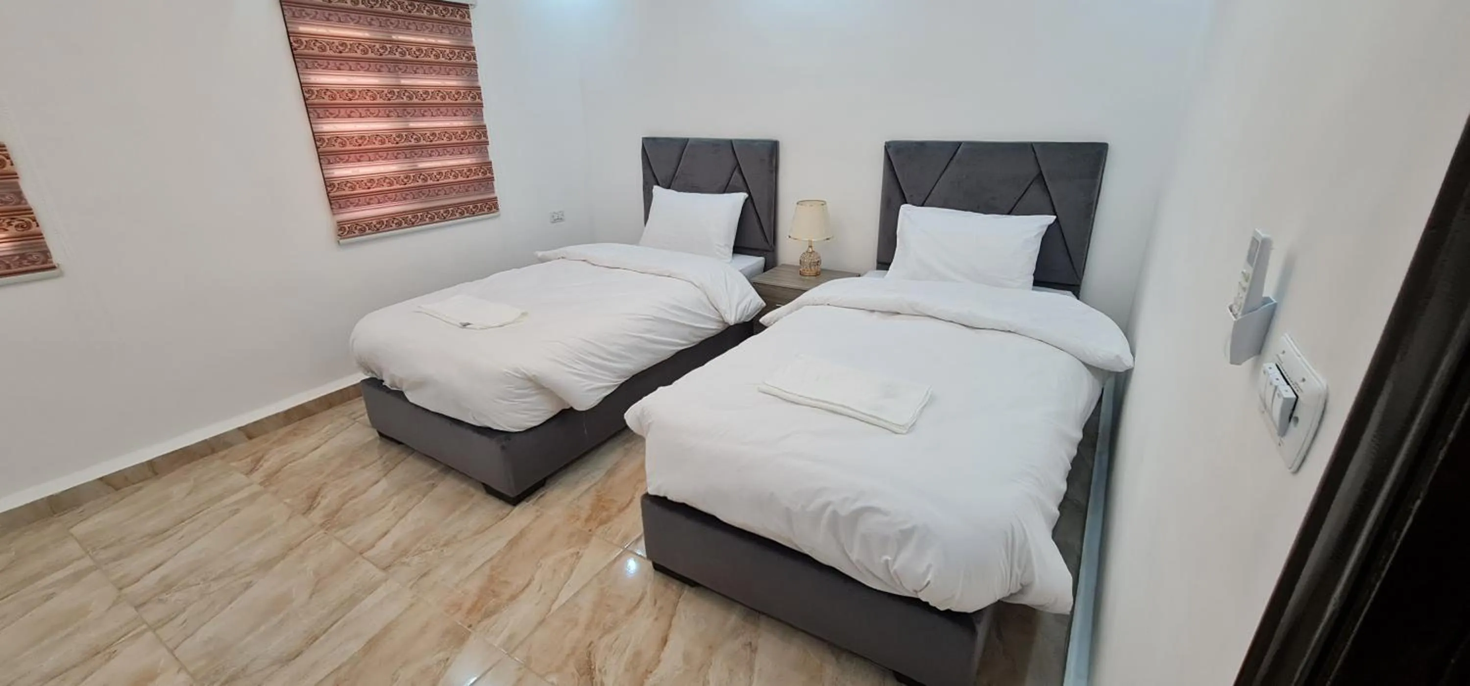 Bed in Nabateans Home Hotel