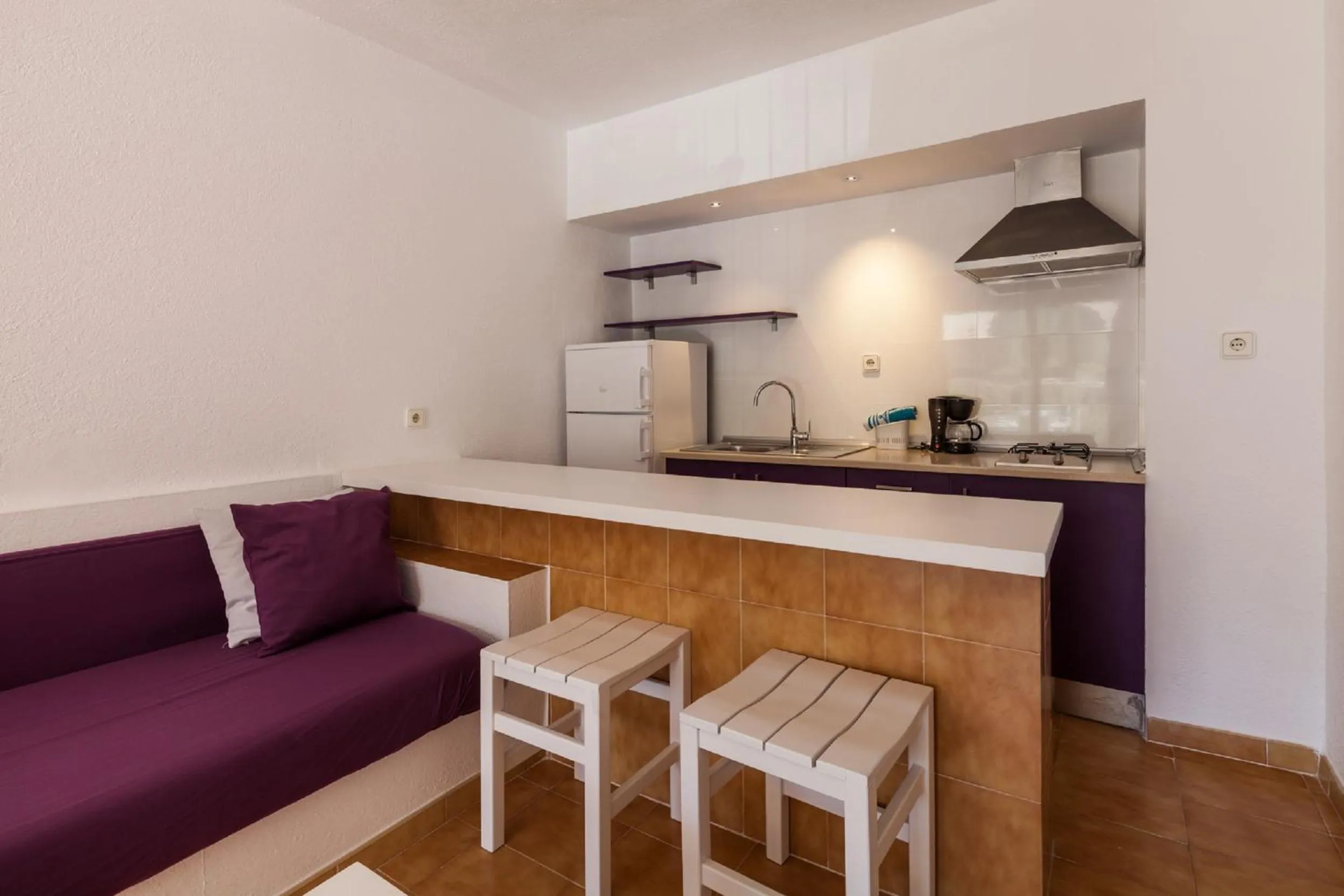 Kitchen or kitchenette in Aparthotel Puerto Cala Vadella