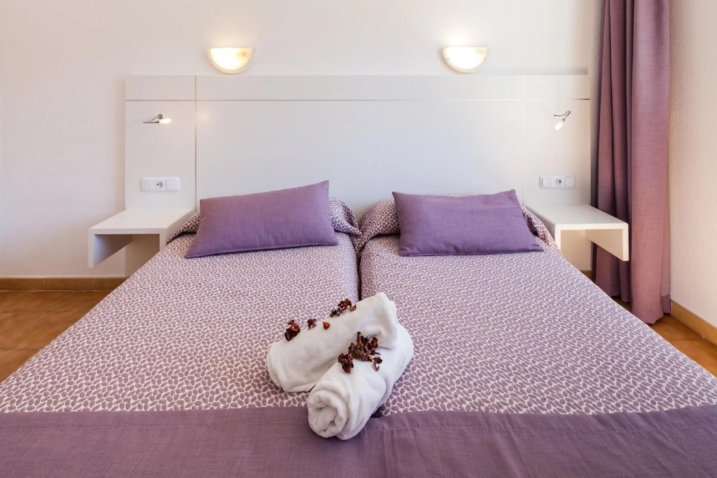 Bed in Aparthotel Puerto Cala Vadella