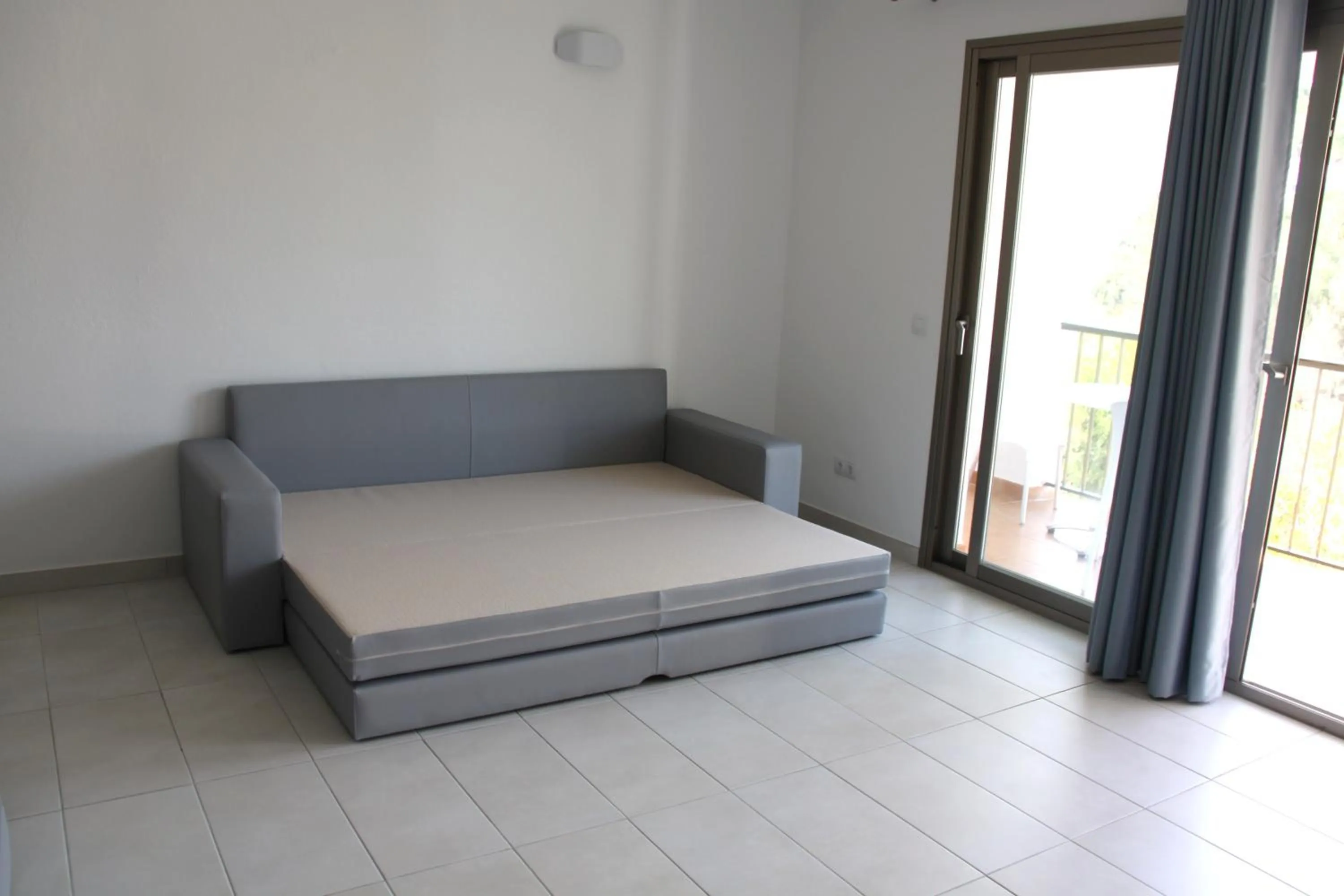 Living room, Bed in Aparthotel Puerto Cala Vadella