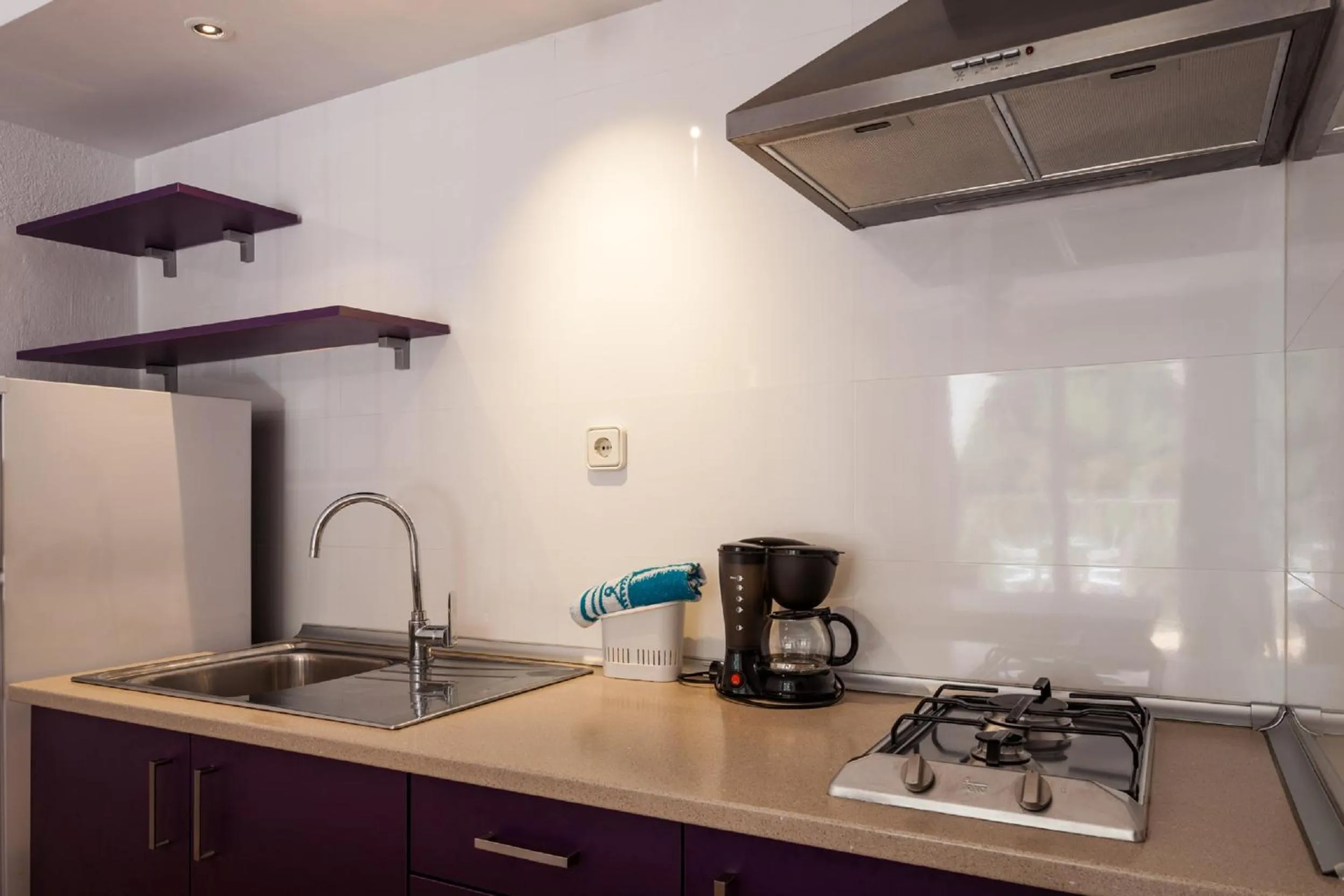 Kitchen or kitchenette in Aparthotel Puerto Cala Vadella