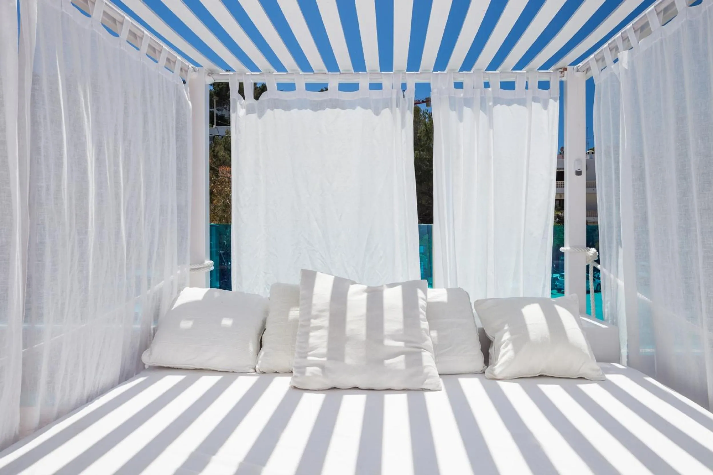 Swimming pool, Bed in Aparthotel Puerto Cala Vadella