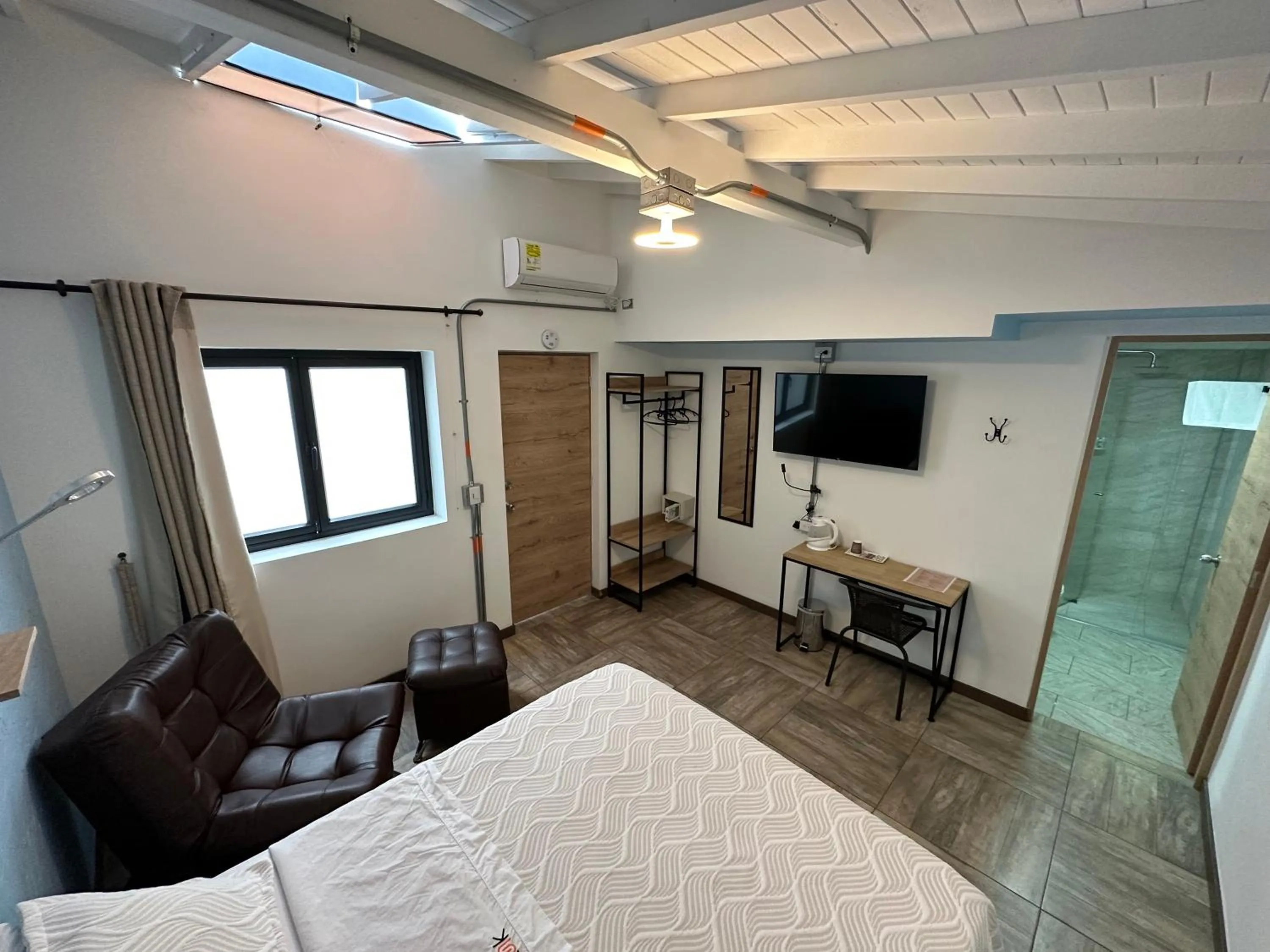 Bed in CoLinkHouse Hotel