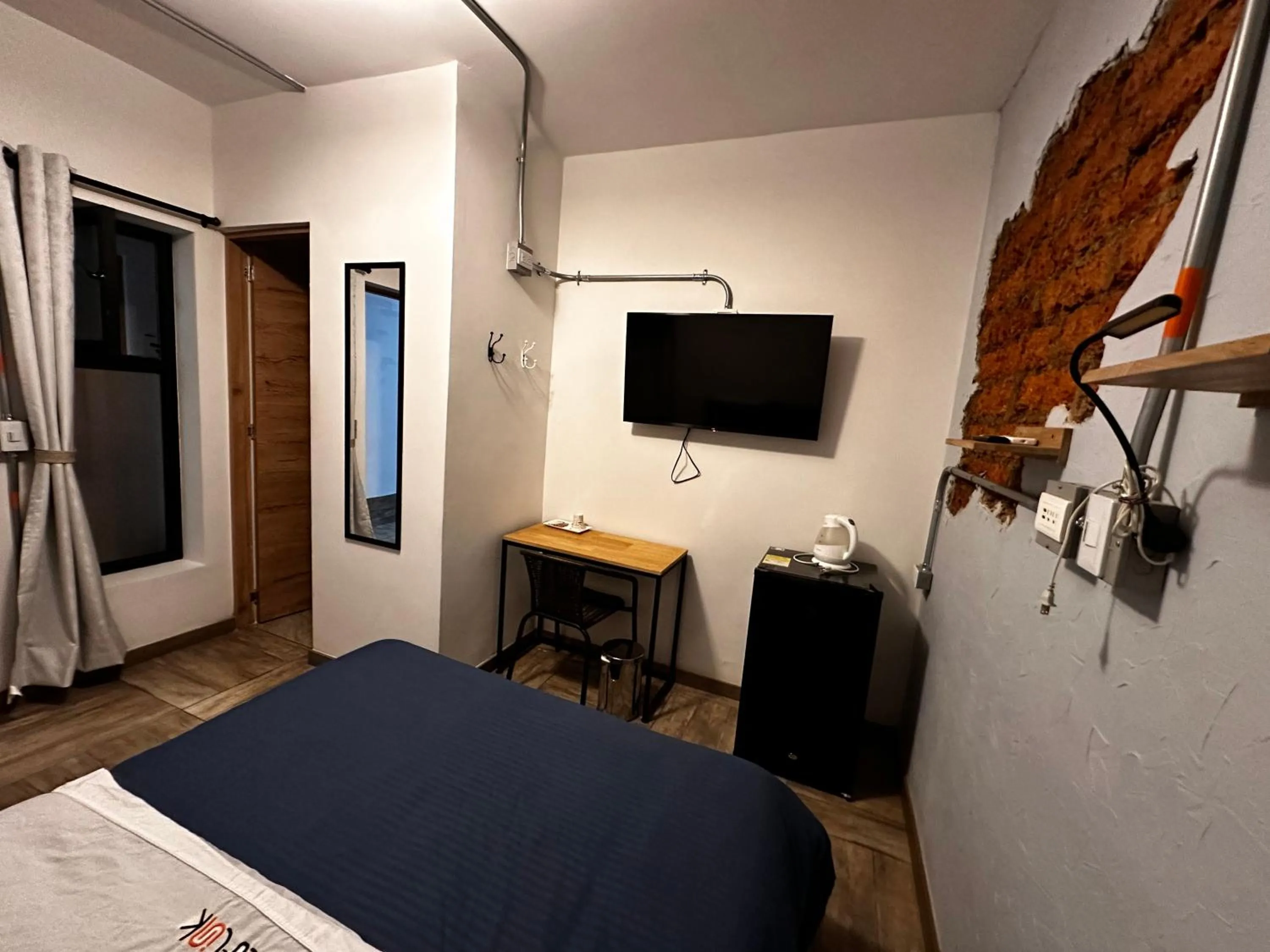 Bed in CoLinkHouse Hotel