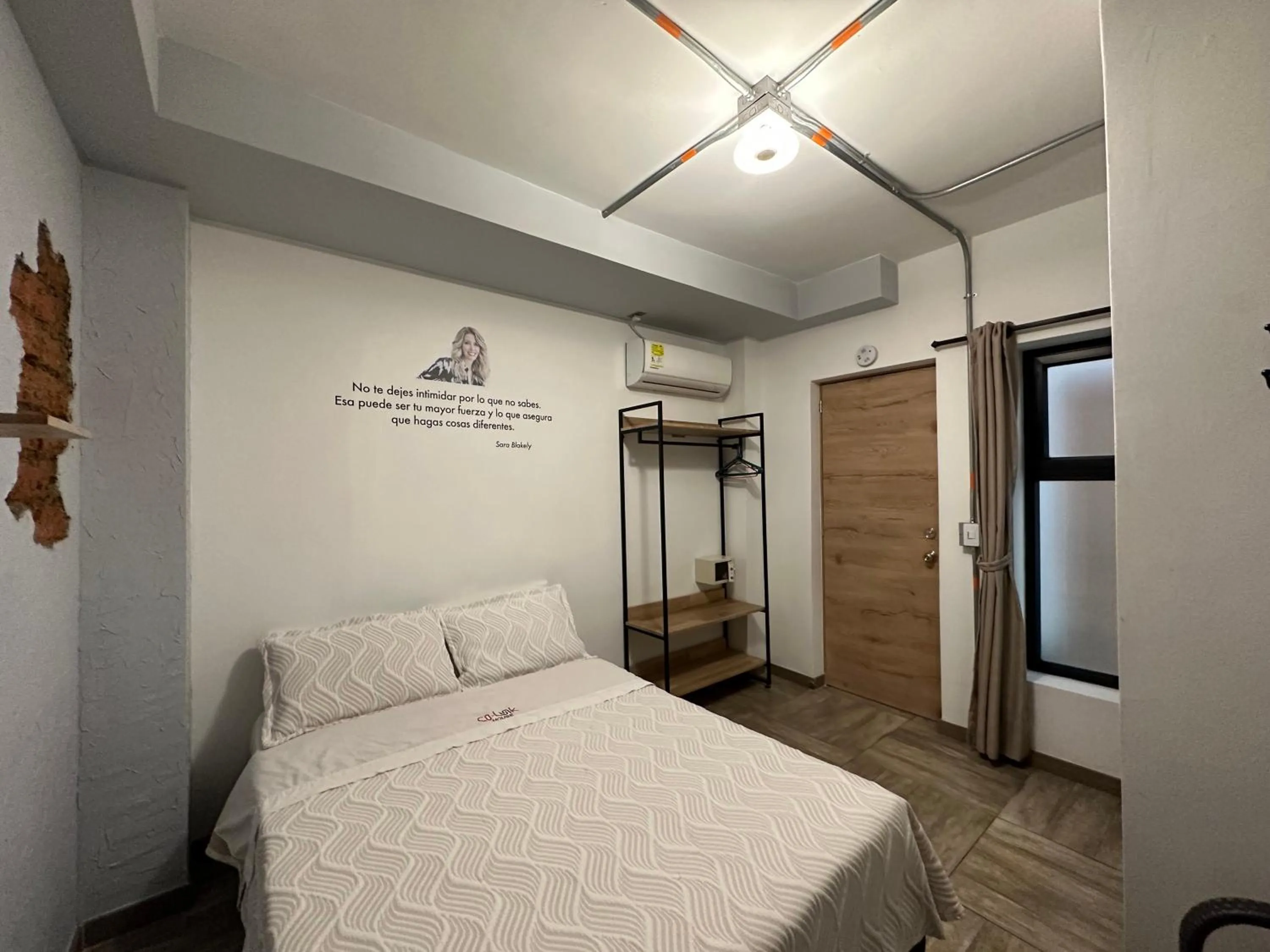 Bed in CoLinkHouse Hotel