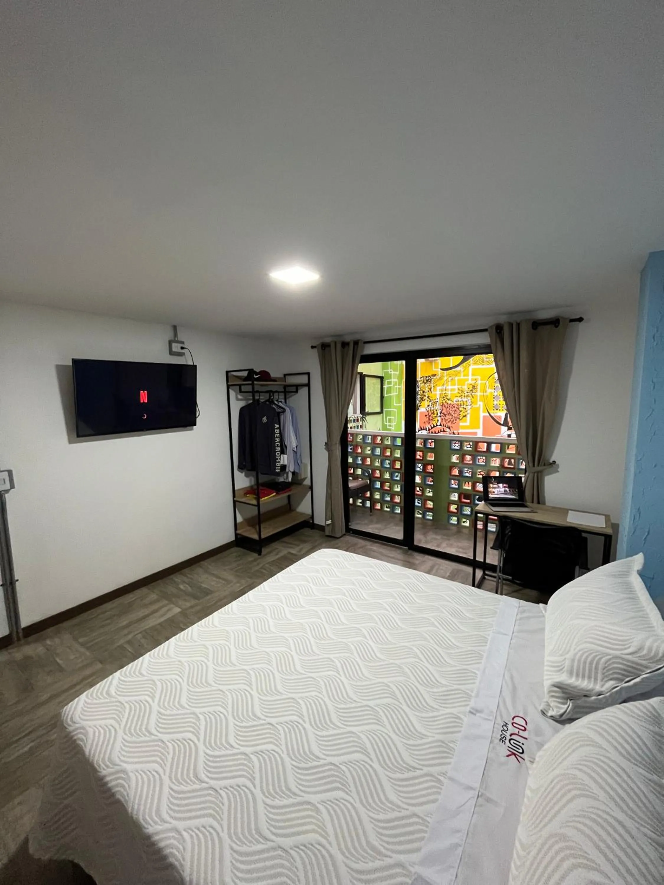 Bed in CoLinkHouse Hotel