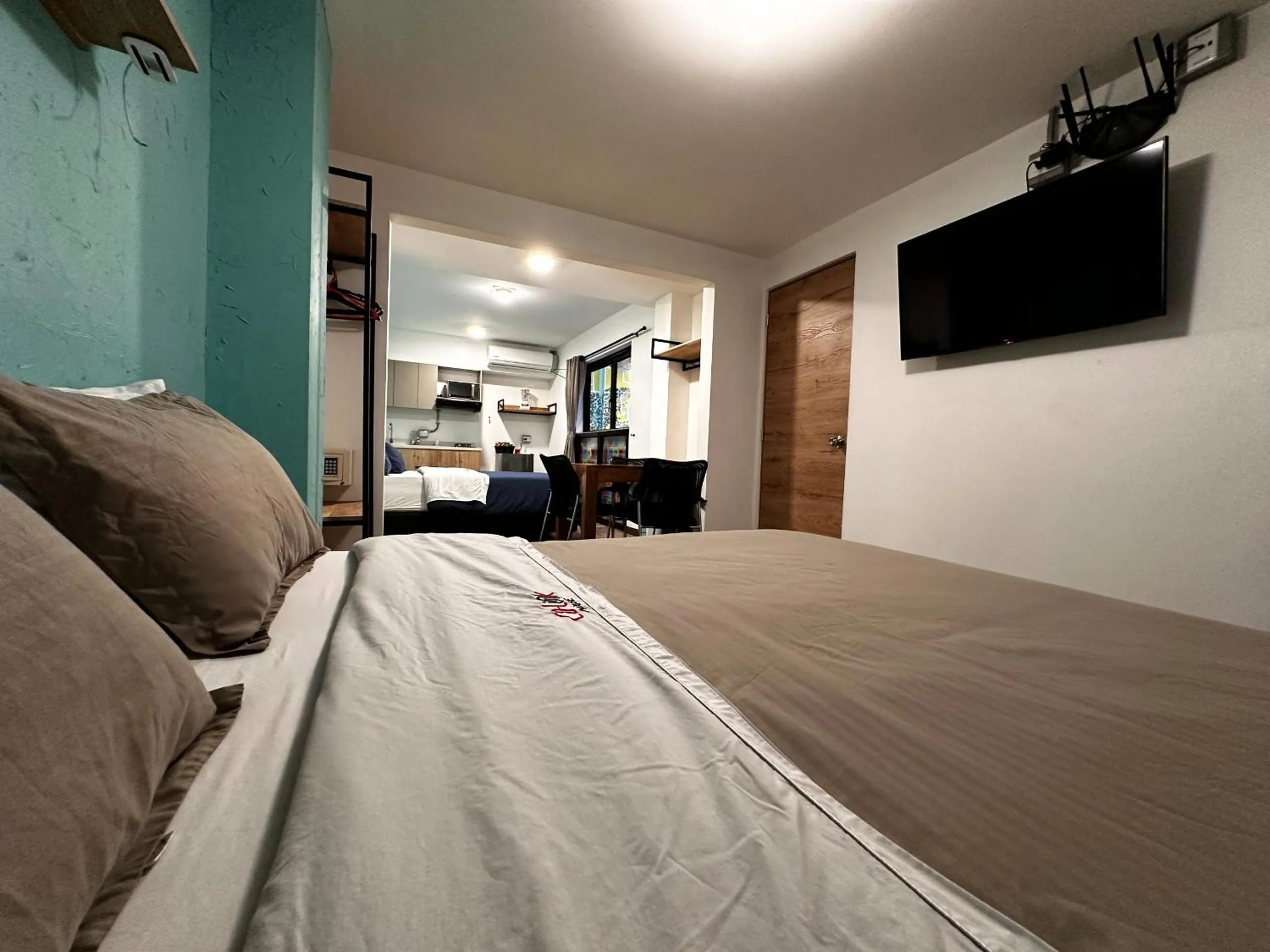 Bed in CoLinkHouse Hotel