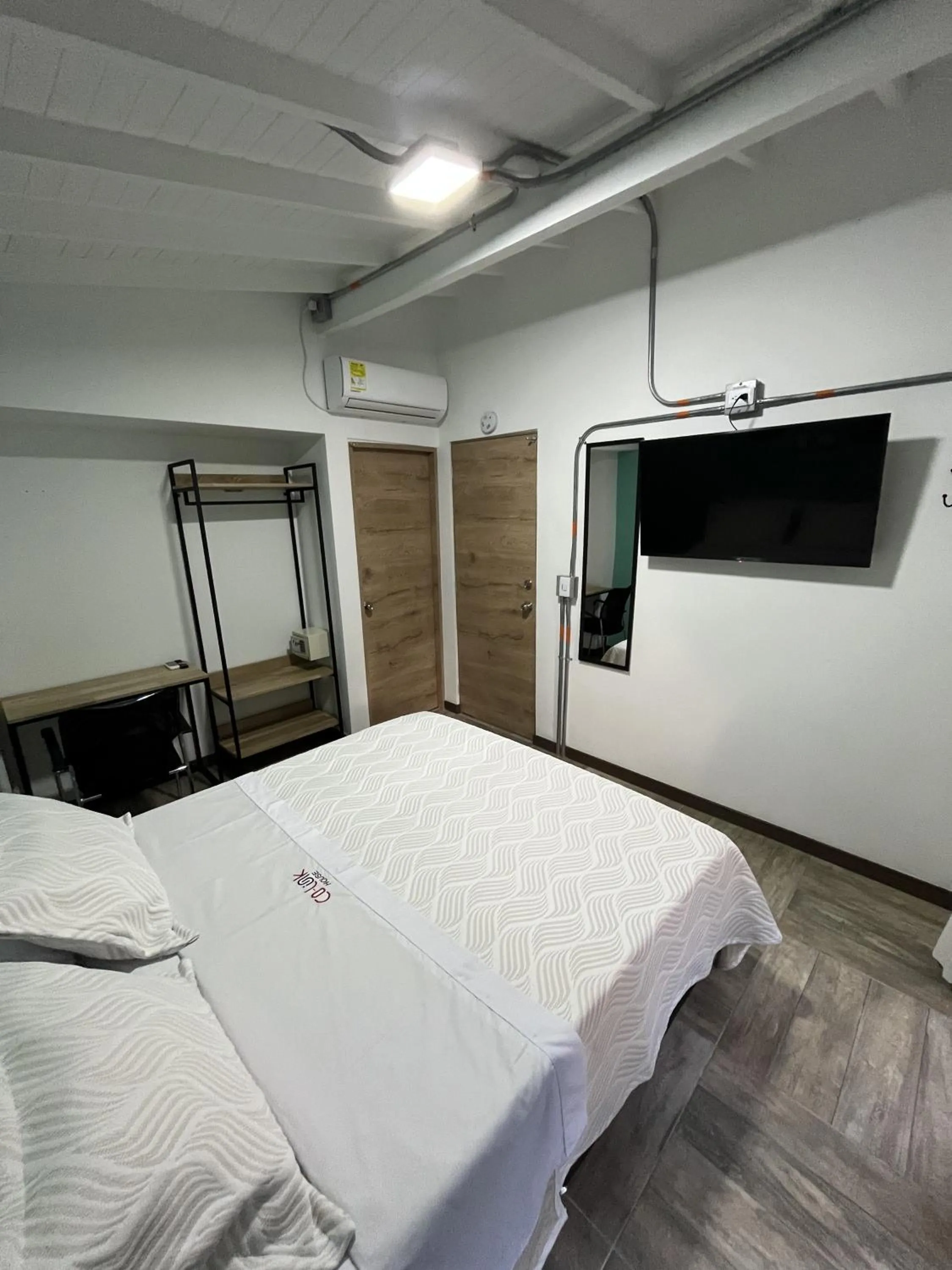 Bed in CoLinkHouse Hotel