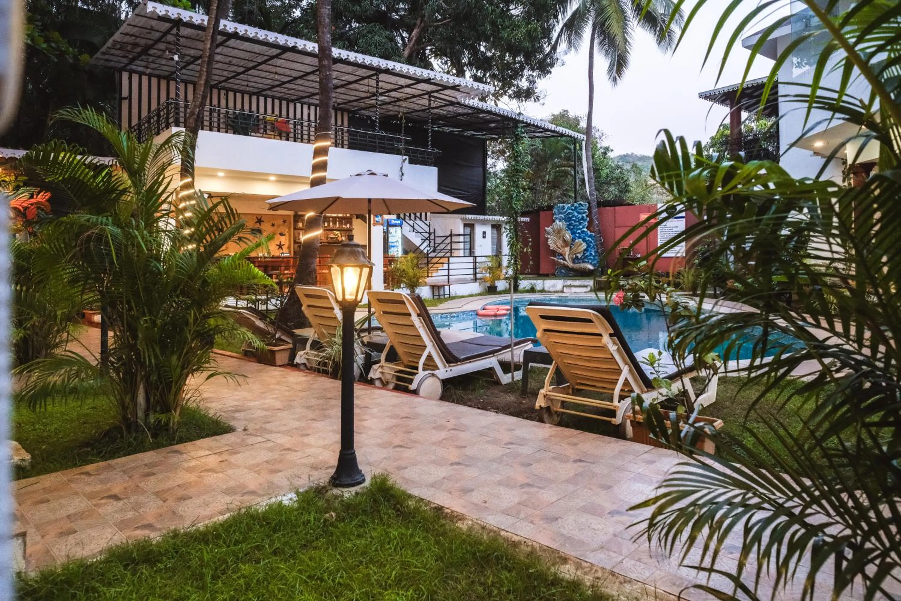 Pool view in The Verda De Miranda Resort Morjim North Goa