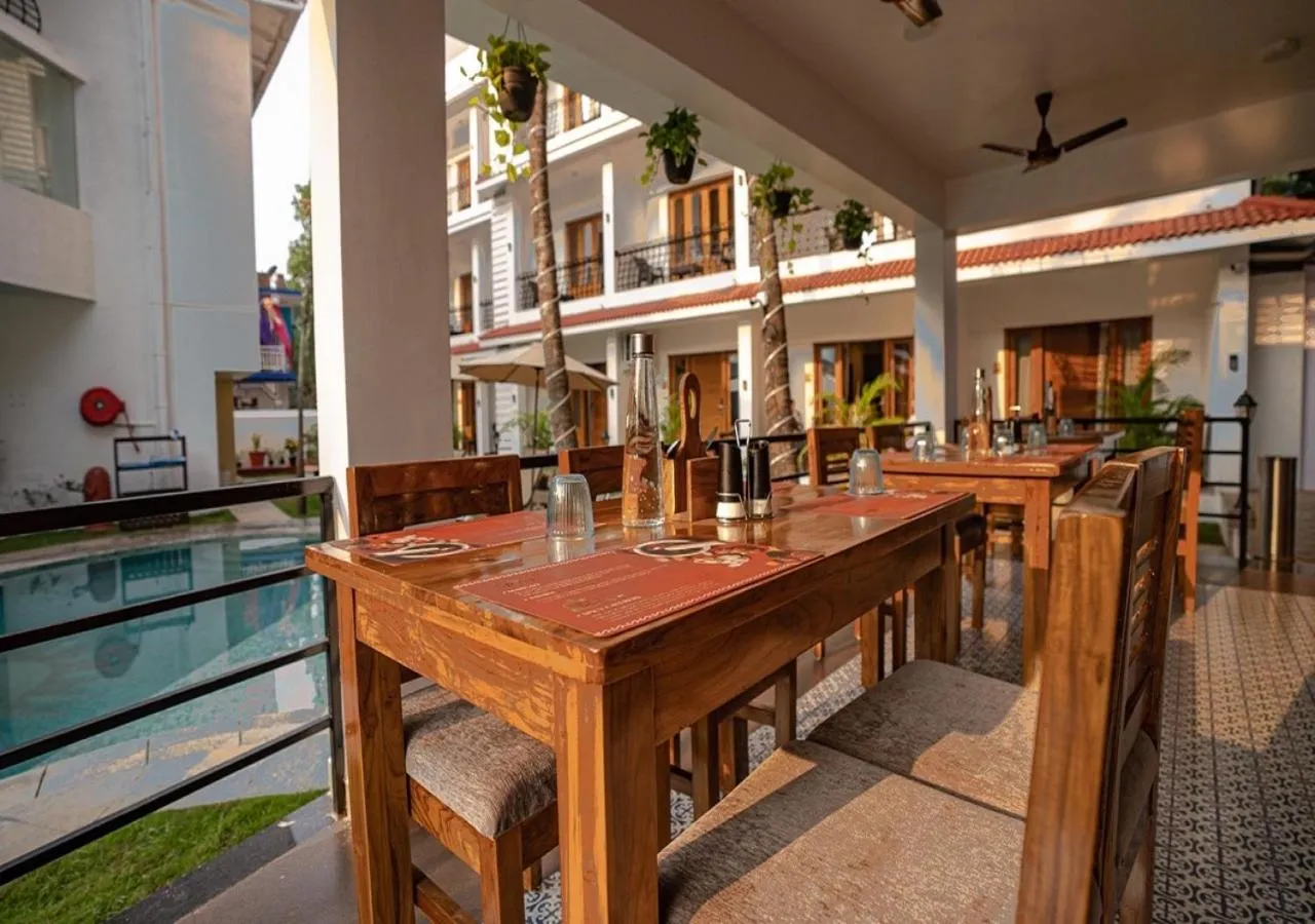 Pool view in The Verda De Miranda Resort Morjim North Goa