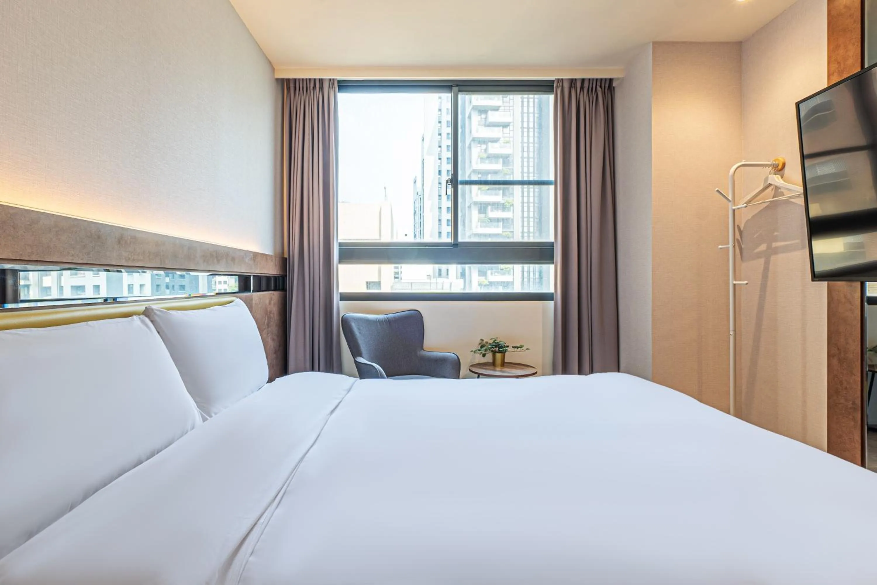 Bed in CHECK inn Taichung Qinghai