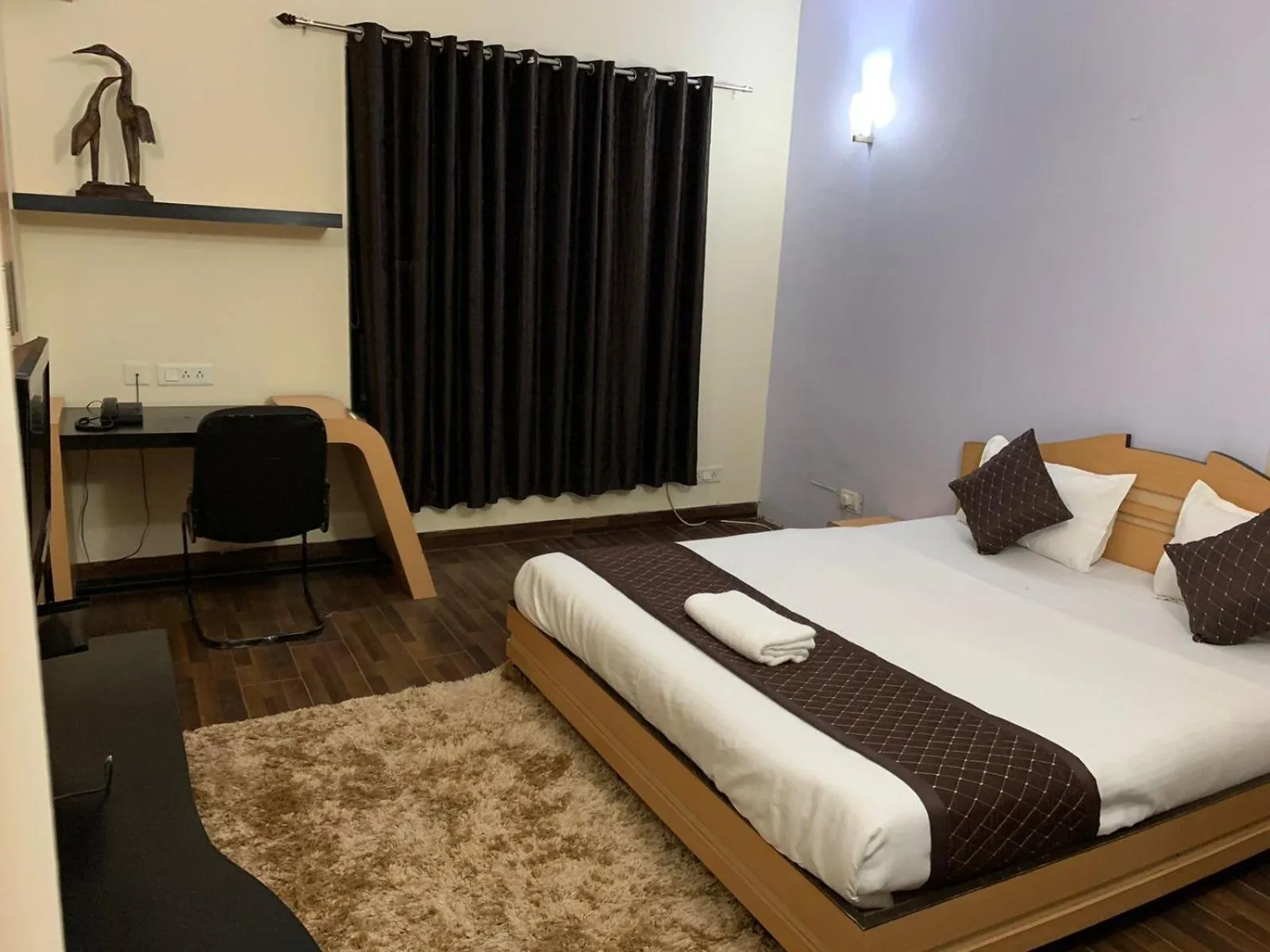 Photo of the whole room, Bed in THE REJOICE VENTURE