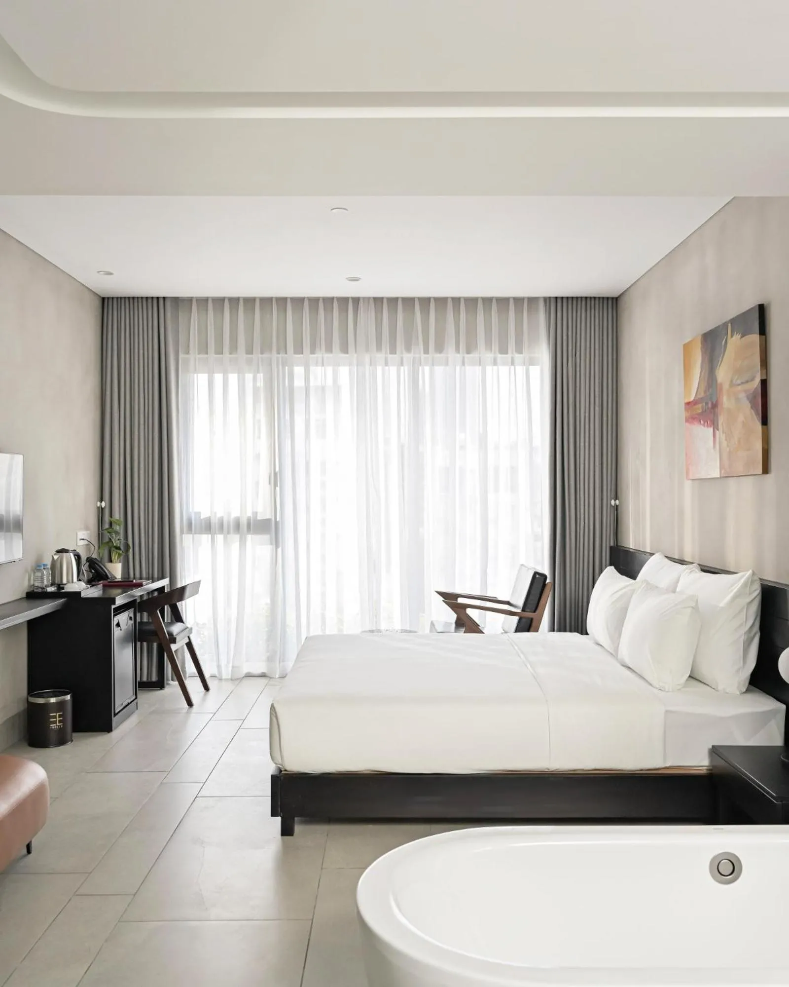 Seating area, Bed in Triple E Hotel Metro Ben Thanh