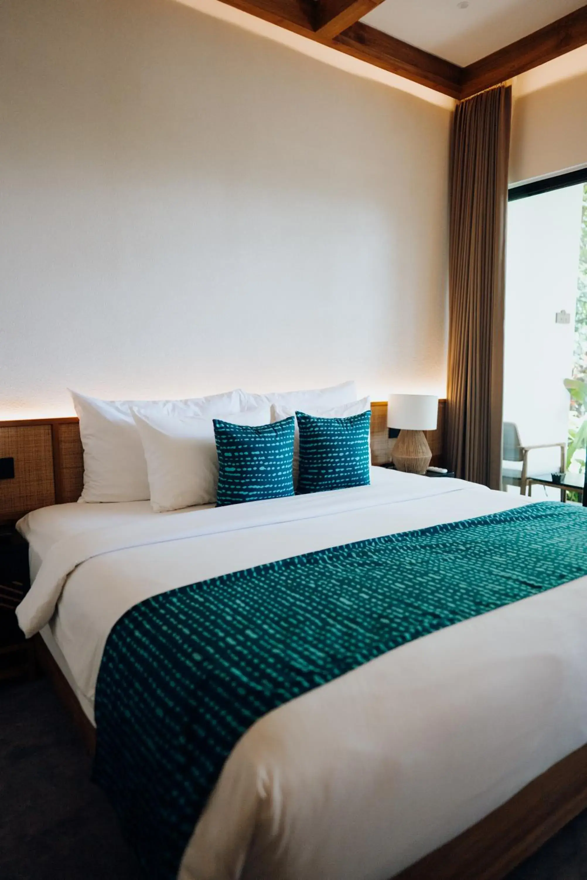 Bed in Deep Roots Dive & Yoga Resort Bed in Deep Roots Dive & Yoga Resort