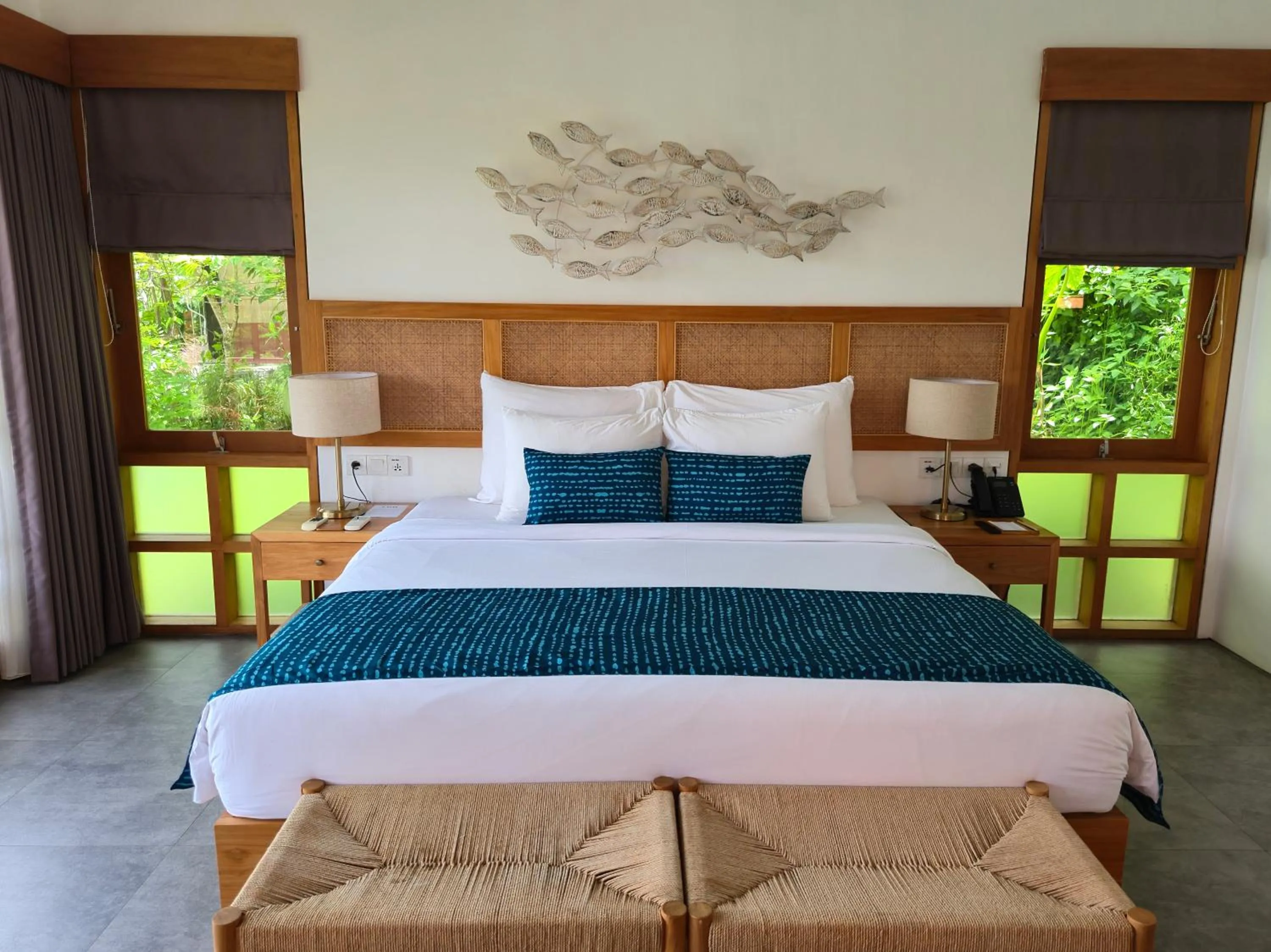Bed in Deep Roots Dive & Yoga Resort