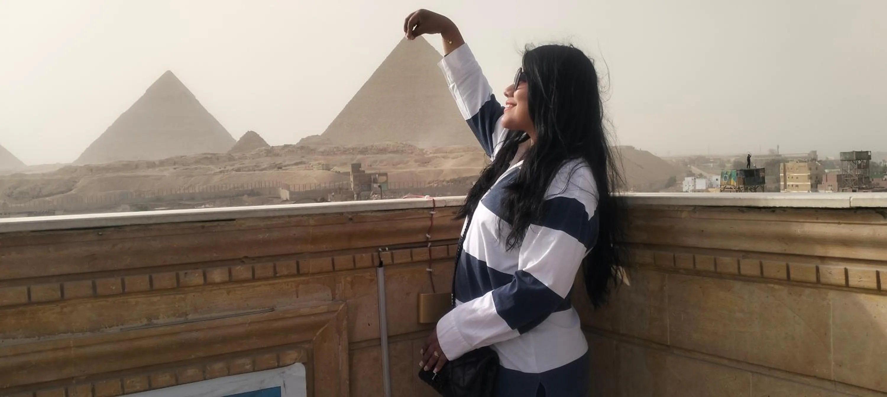 group of guests in Zeina pyramids view