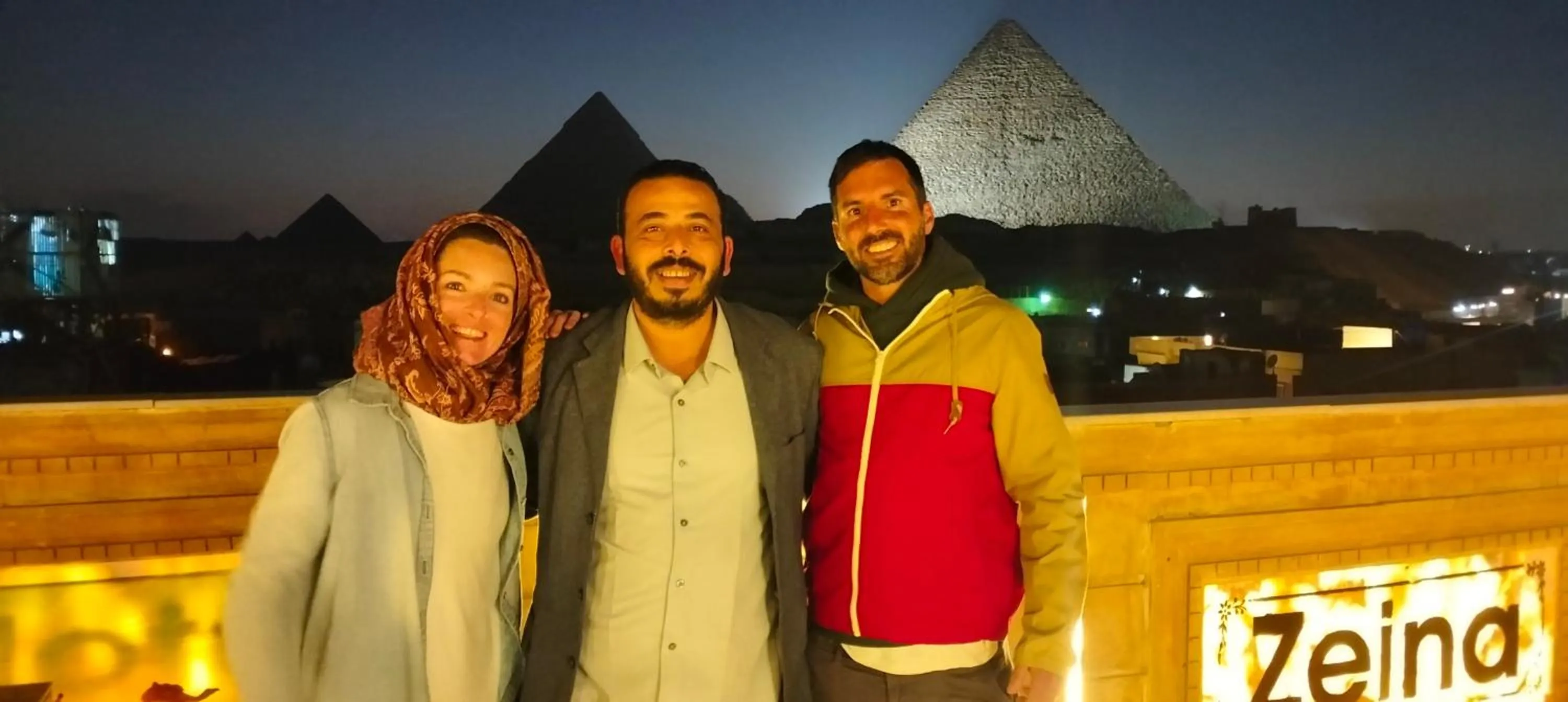 group of guests in Zeina pyramids view