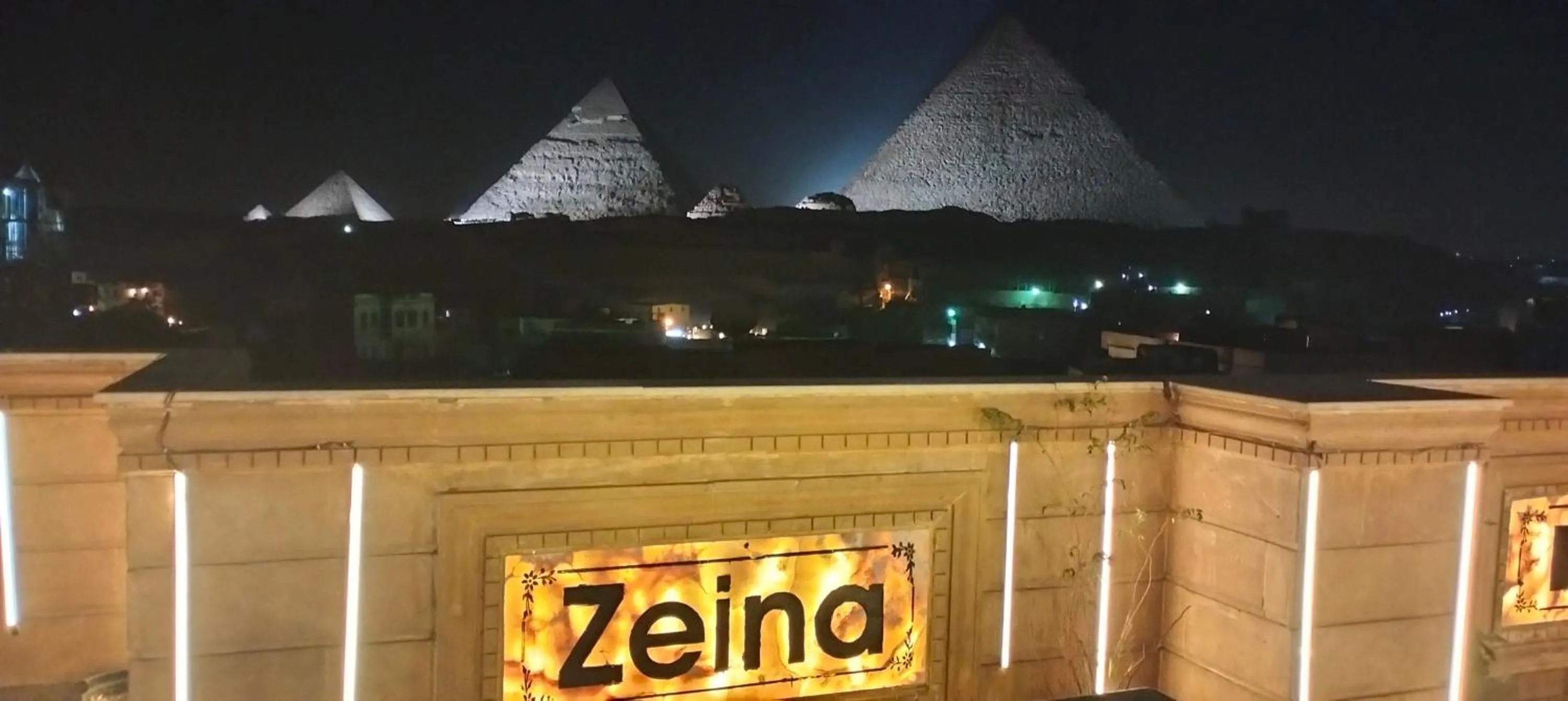 Night in Zeina pyramids view