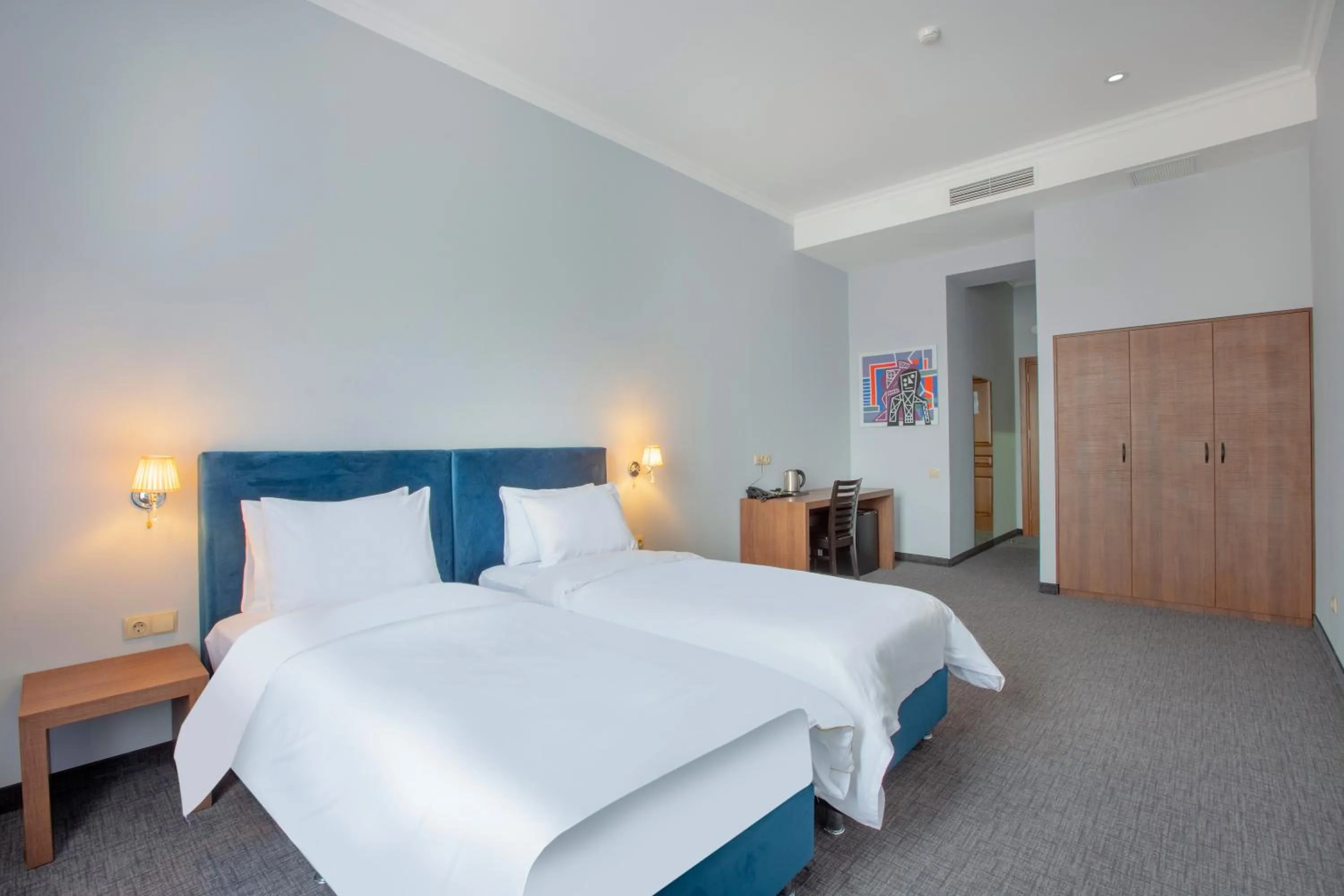 Bed in Alma Boutique Hotel