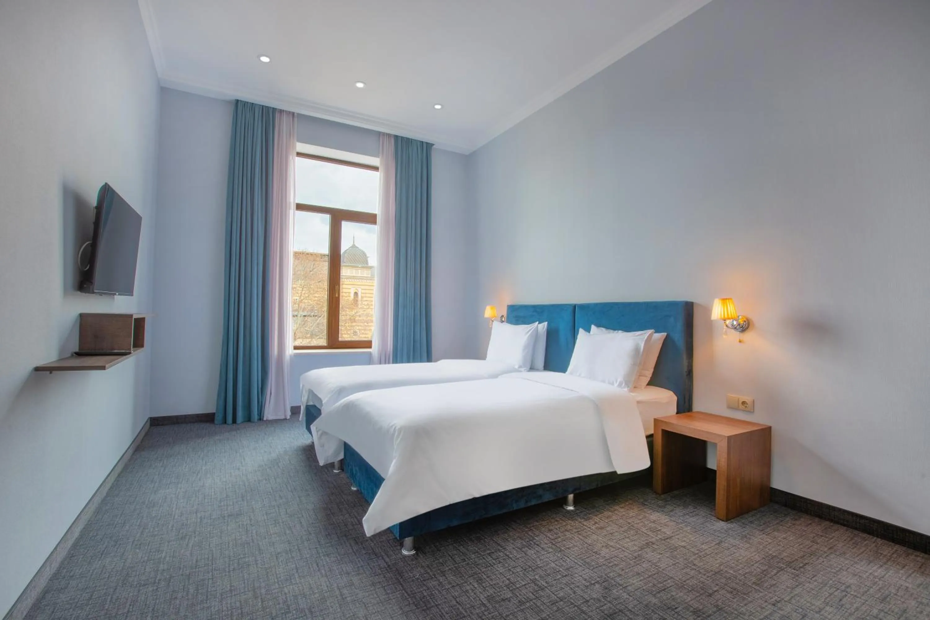 Bed in Alma Boutique Hotel