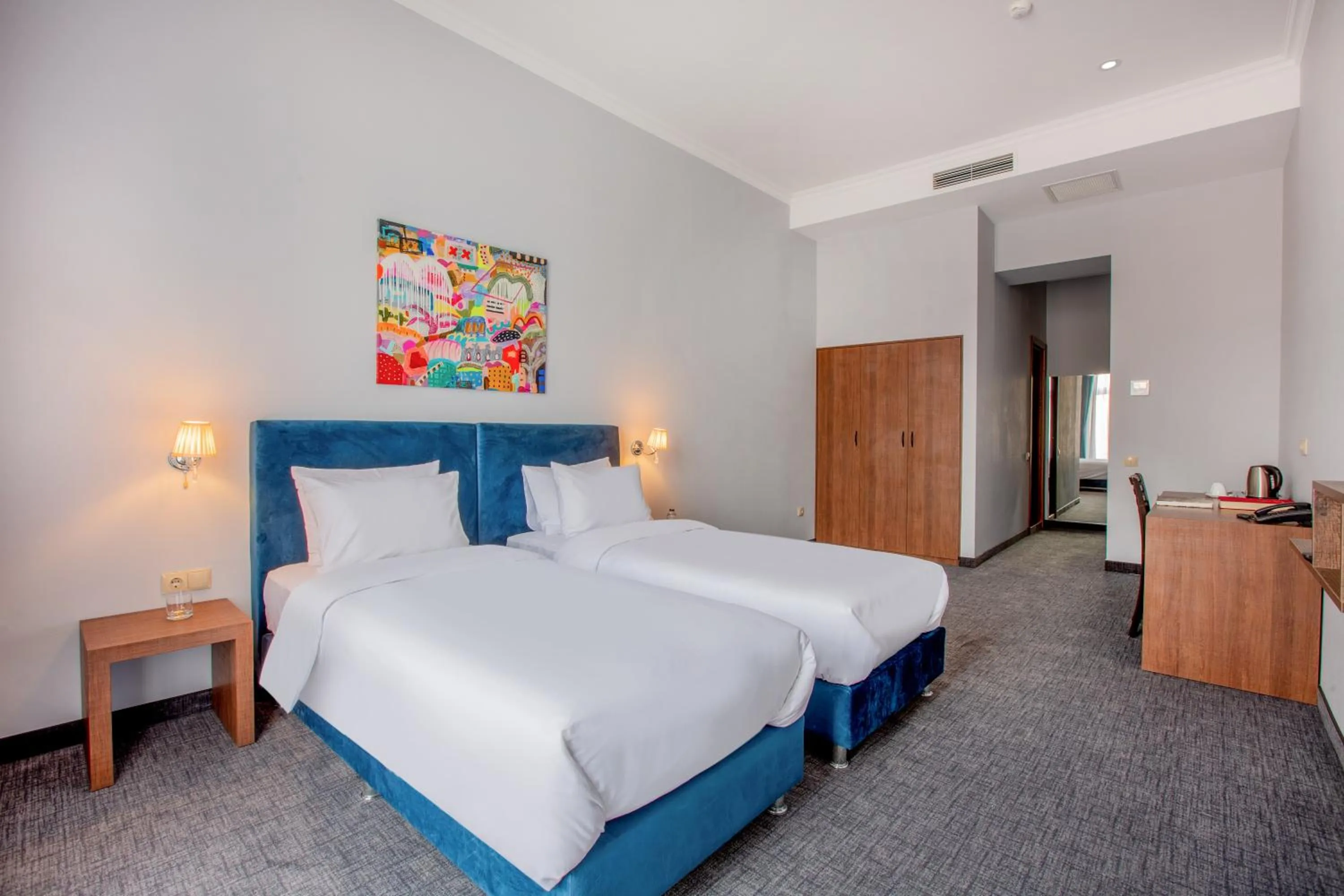 Bed in Alma Boutique Hotel