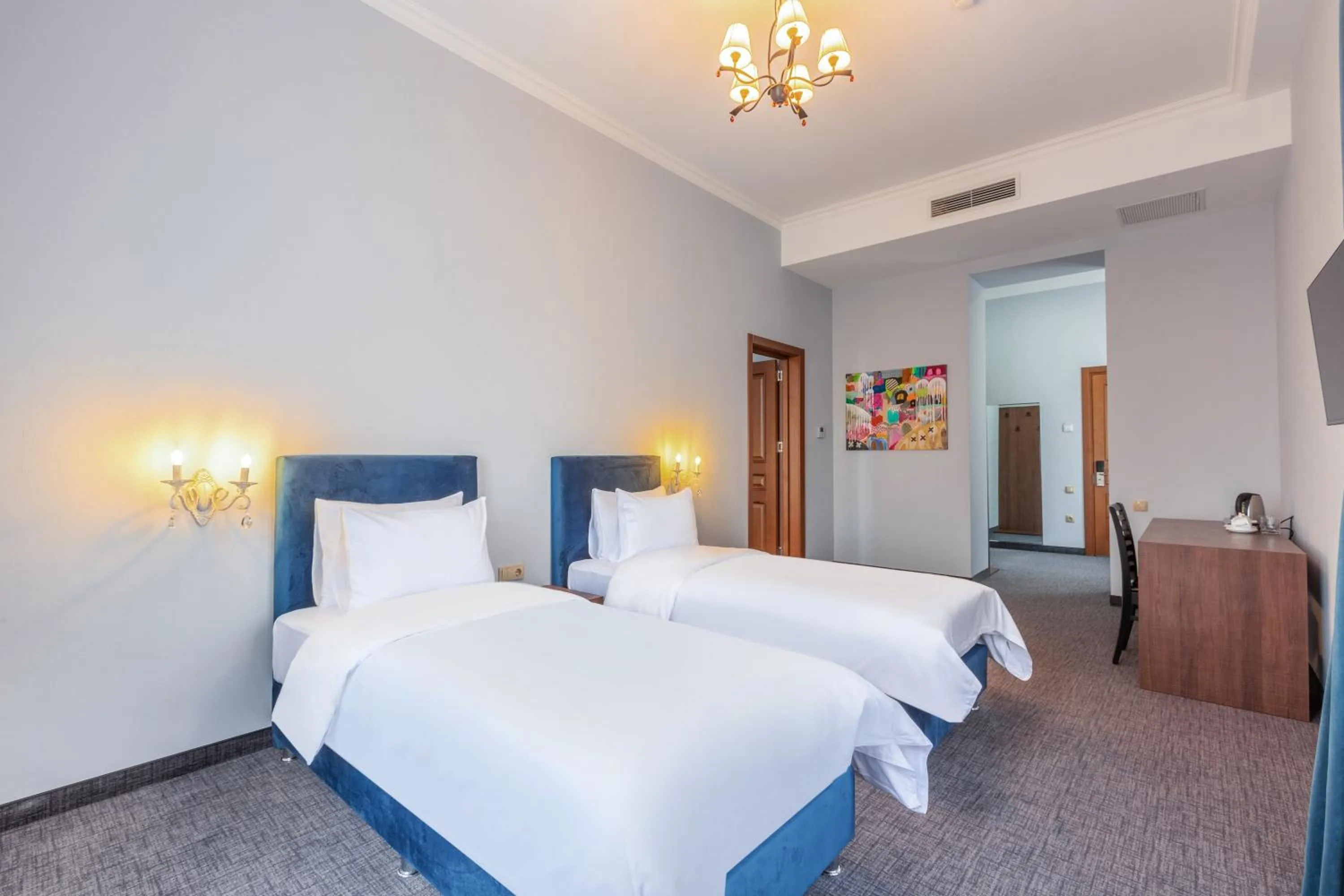 Bed in Alma Boutique Hotel