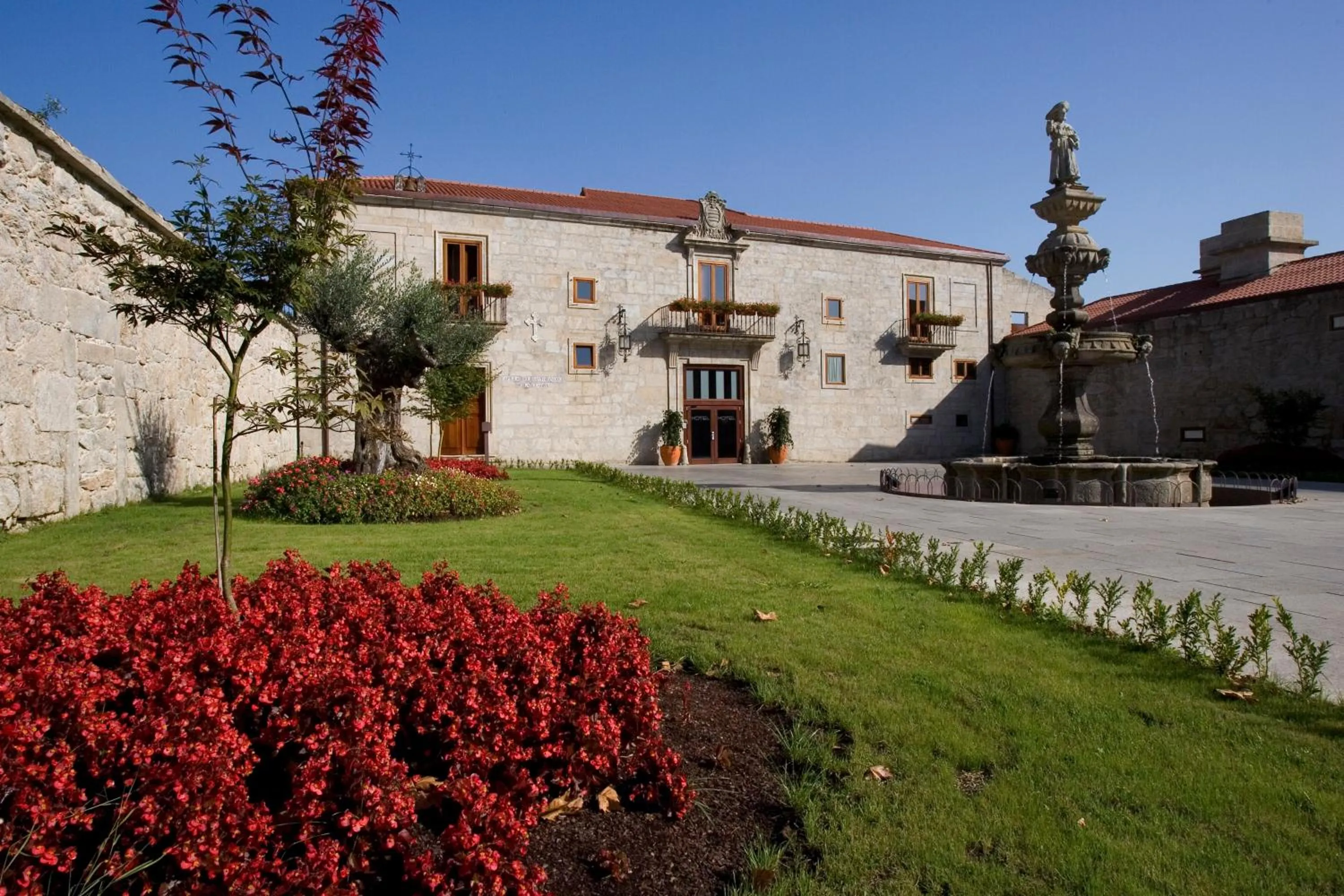 Property building in Hotel Pazo de Lestrove by Pousadas de Compostela