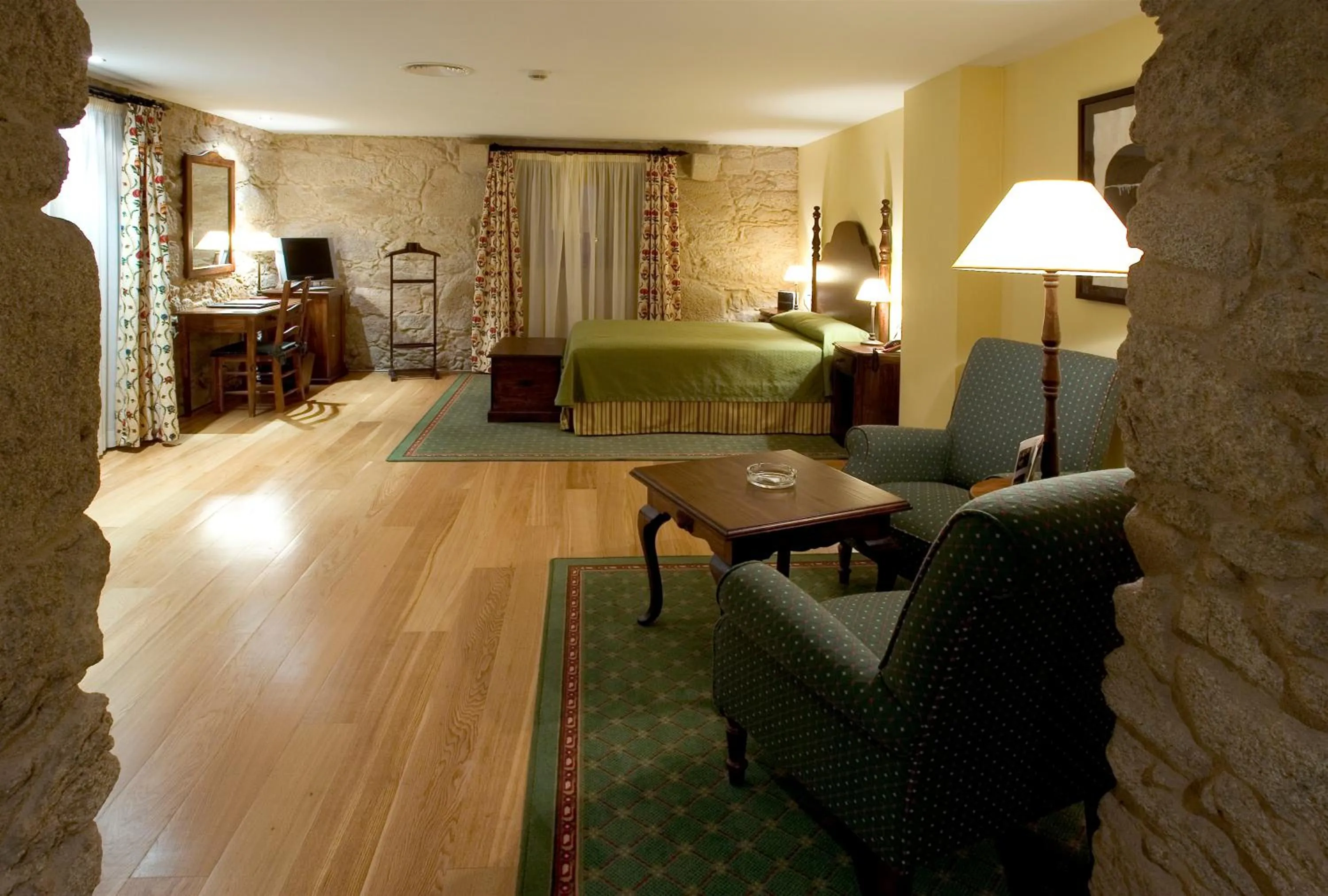 Photo of the whole room, Bed in Hotel Pazo de Lestrove by Pousadas de Compostela