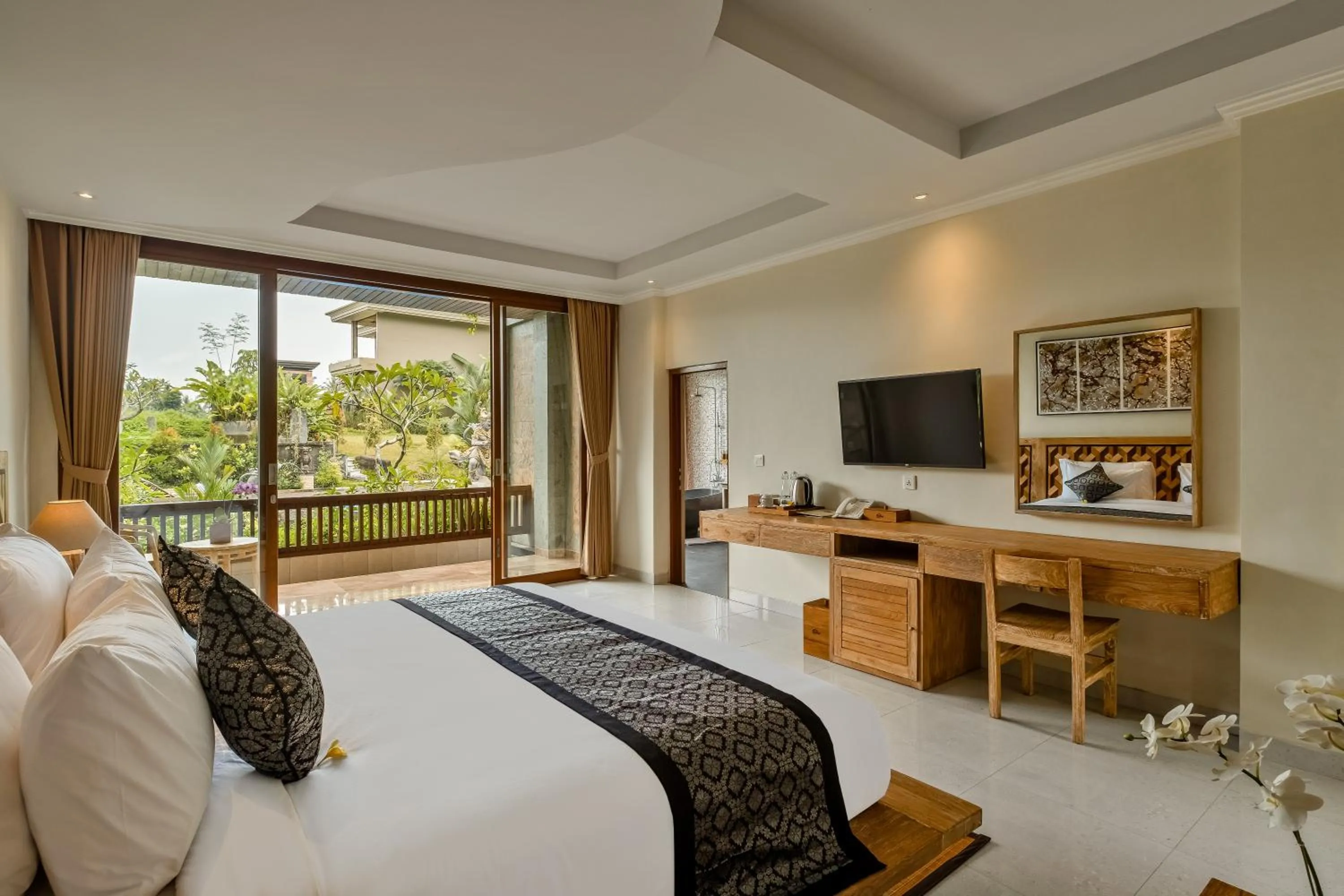 Bed in Gynandha Ubud Cottage