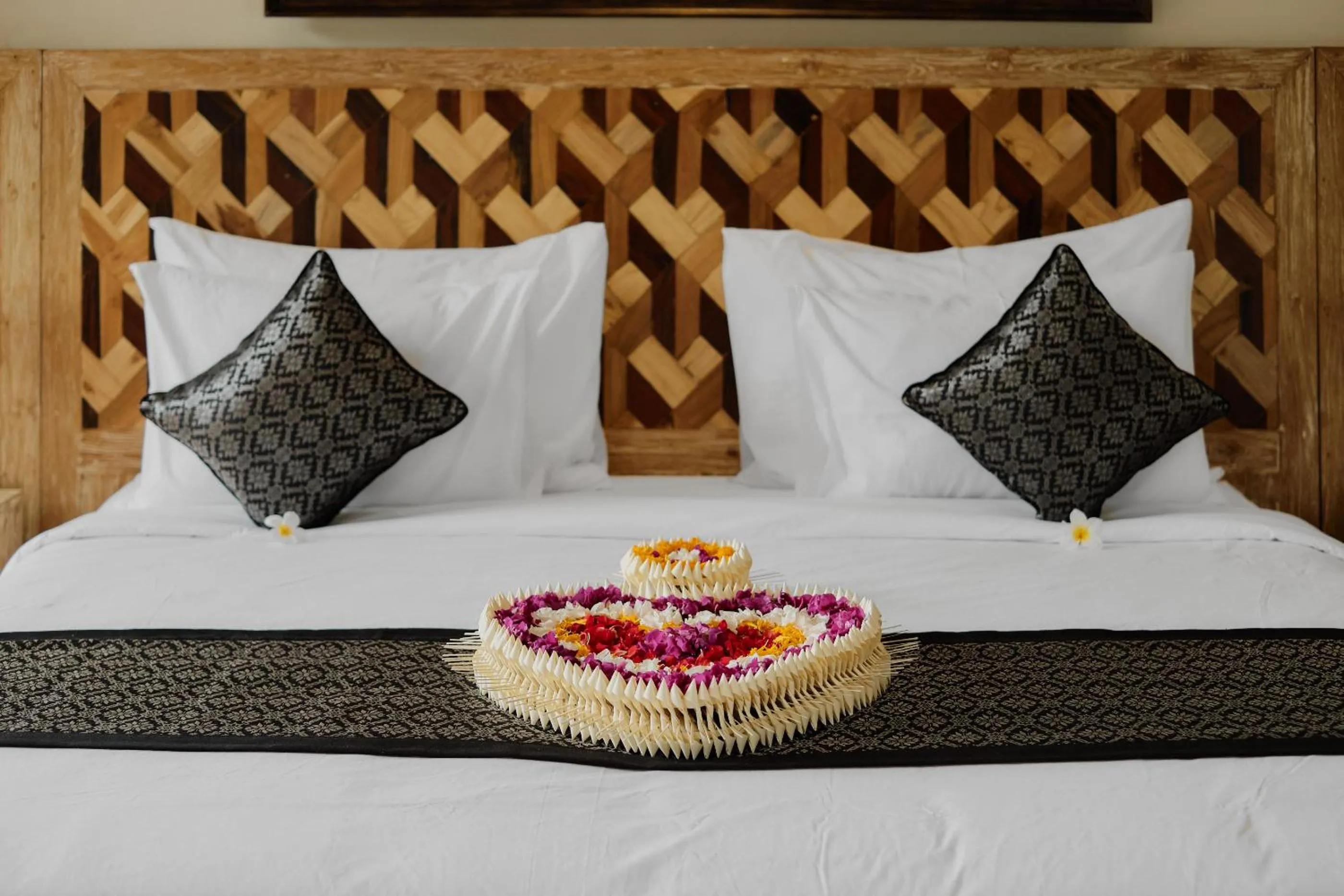 Bed in Gynandha Ubud Cottage