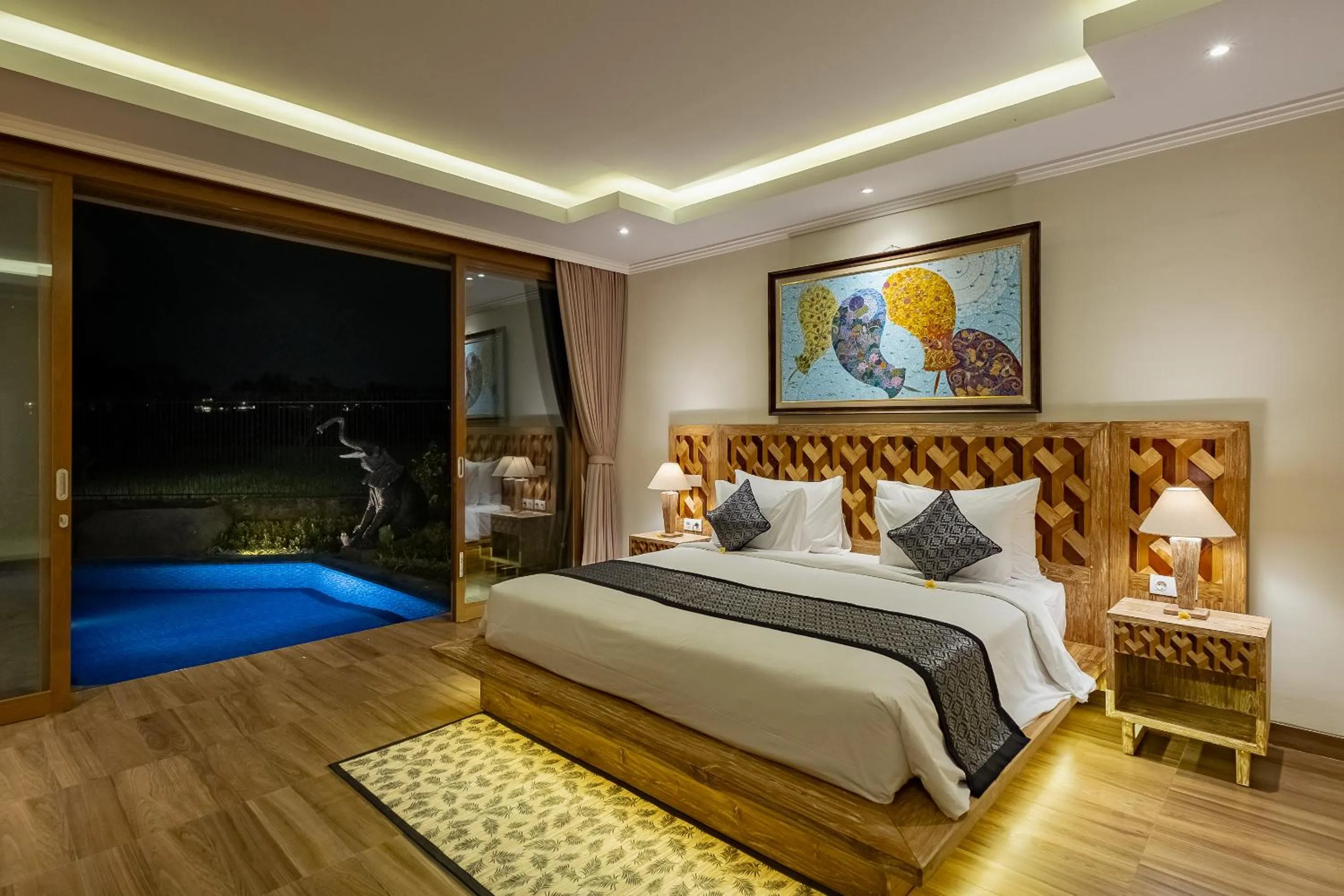 Bed in Gynandha Ubud Cottage