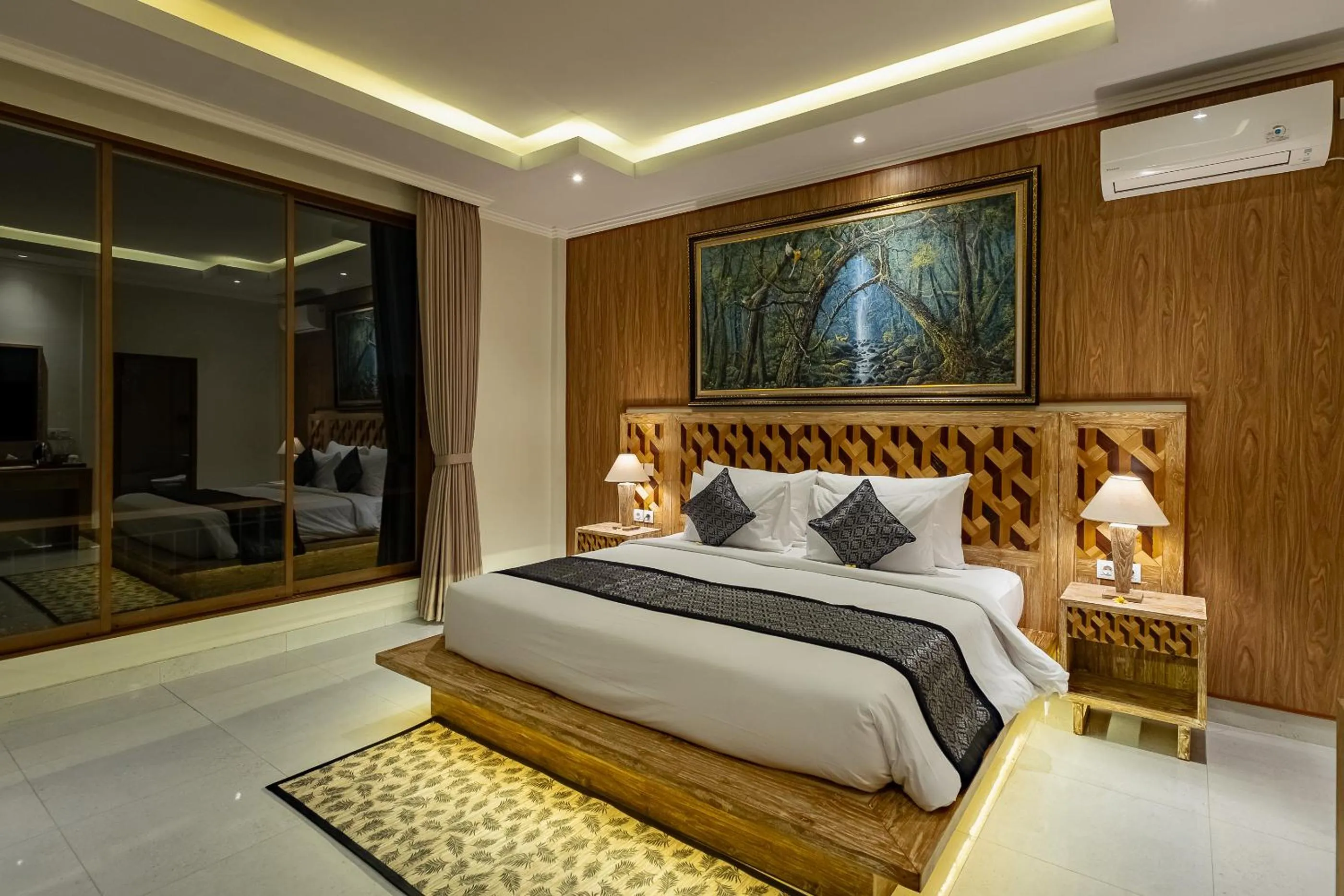 Bed in Gynandha Ubud Cottage