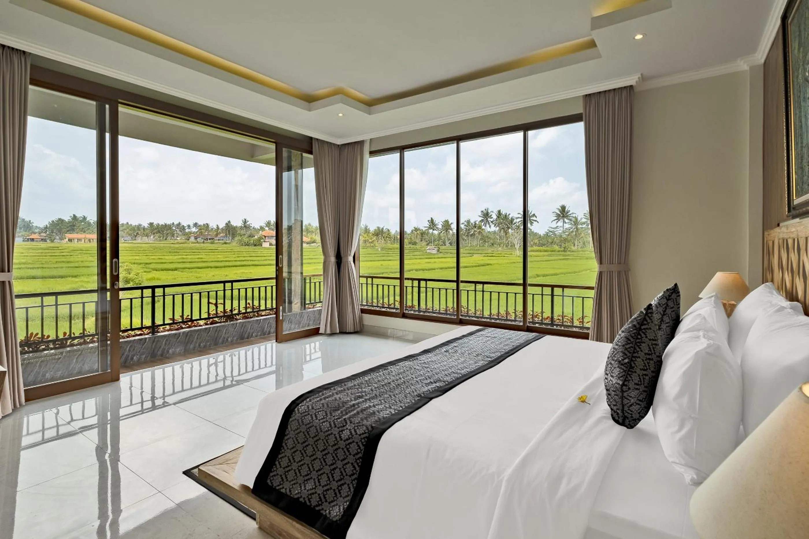 Bed in Gynandha Ubud Cottage