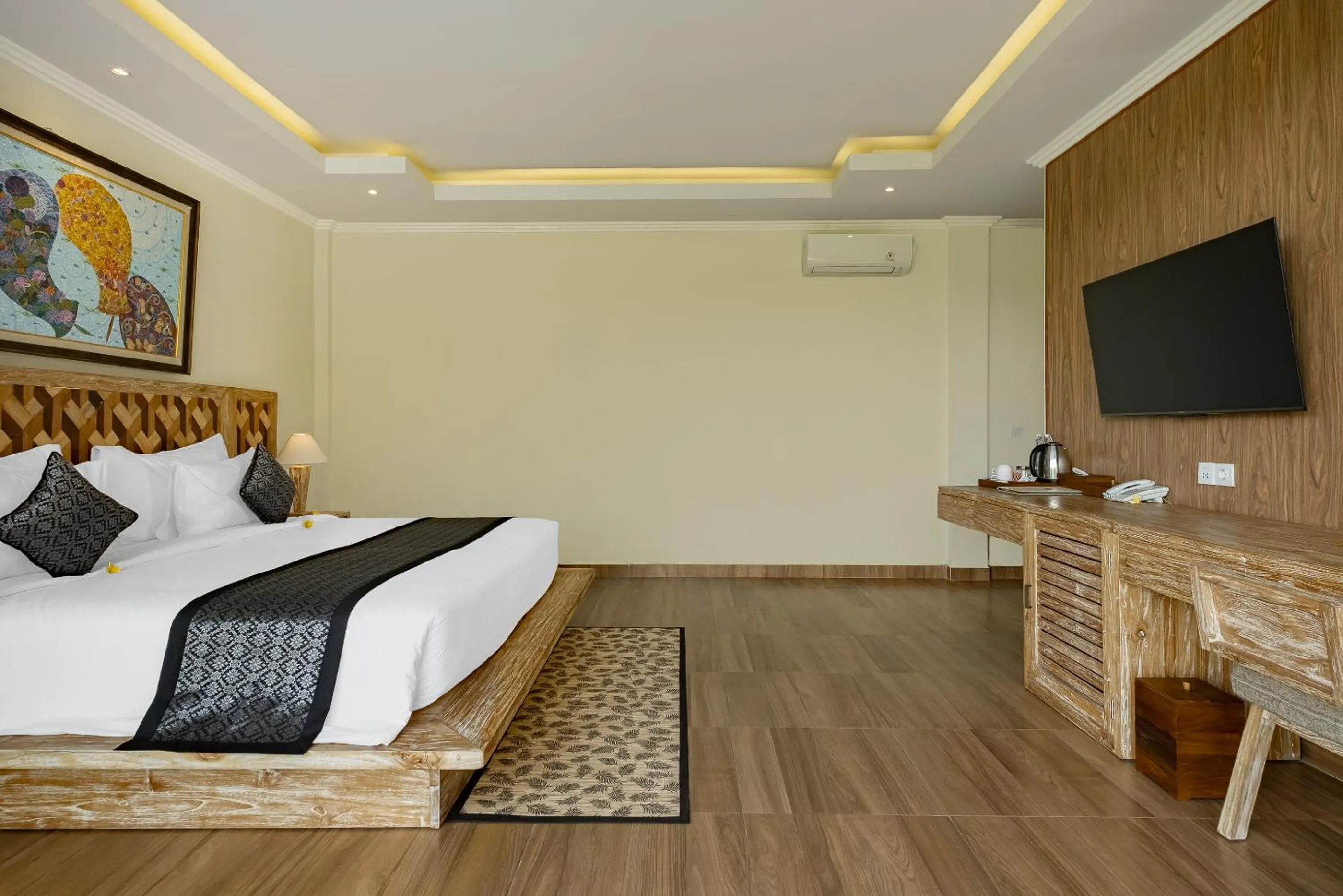 Bed in Gynandha Ubud Cottage