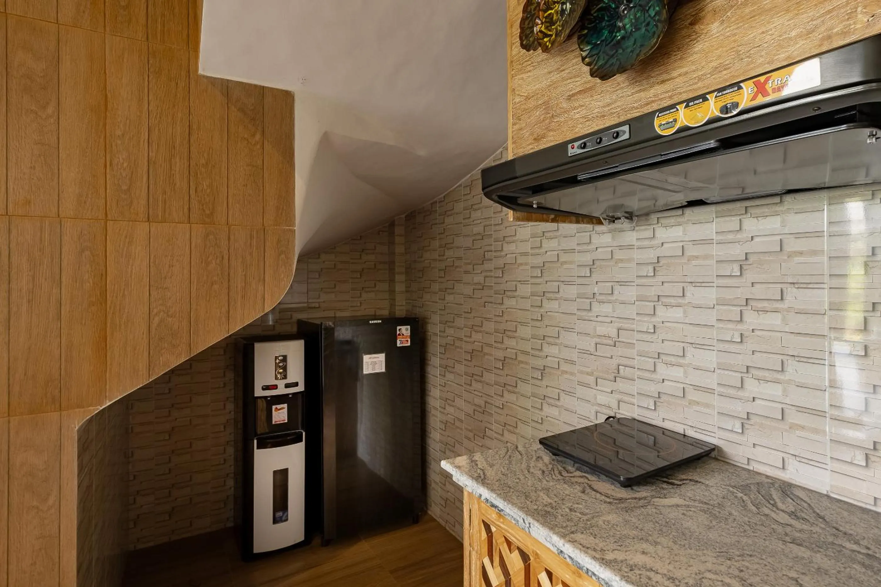 Kitchen or kitchenette in Gynandha Ubud Cottage