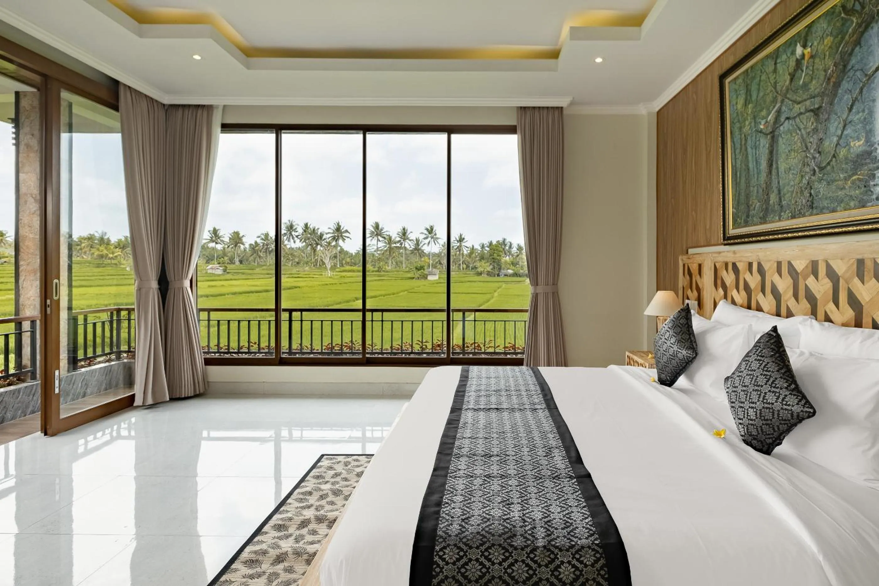 Bed in Gynandha Ubud Cottage