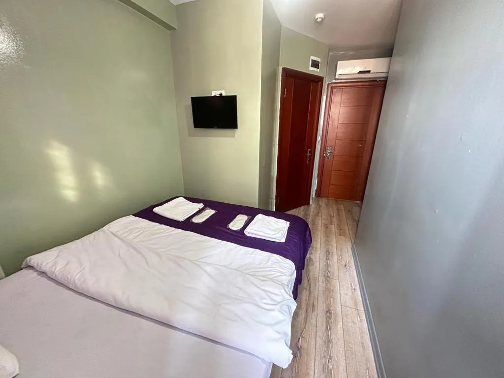 Bed in Taksim Soushian Hotel