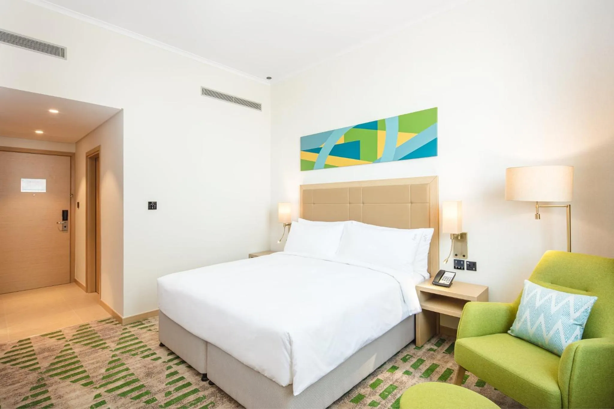 Photo of the whole room, Bed in Holiday Inn & Suites - Dubai Science Park by IHG