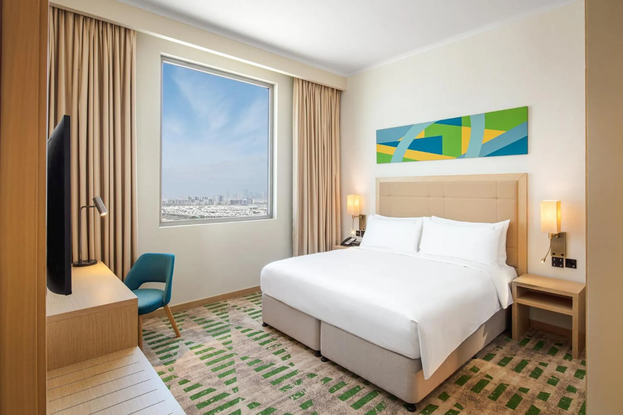 Photo of the whole room, Bed in Holiday Inn & Suites - Dubai Science Park by IHG