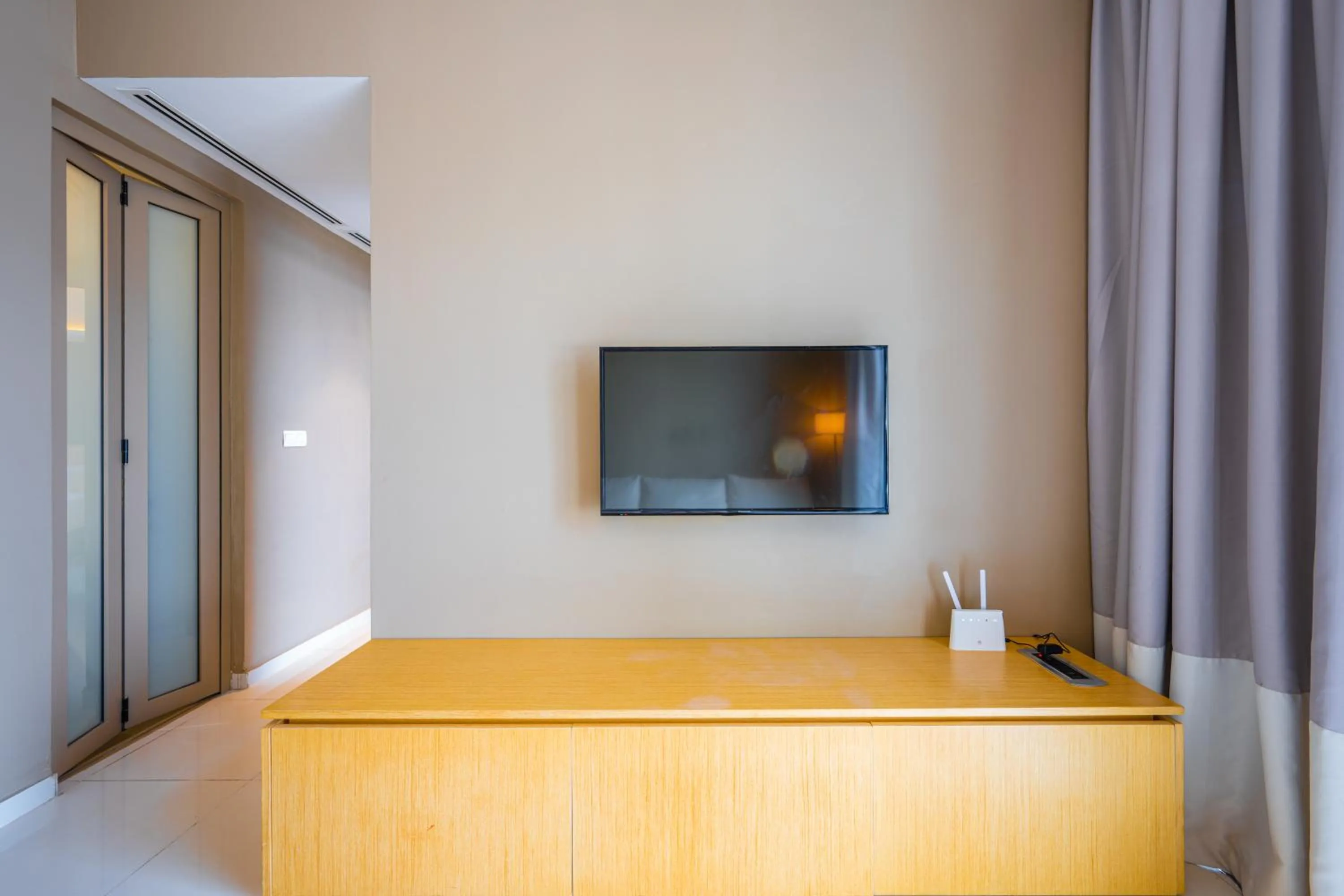 TV and multimedia, Bed in Greystone 99 Suites