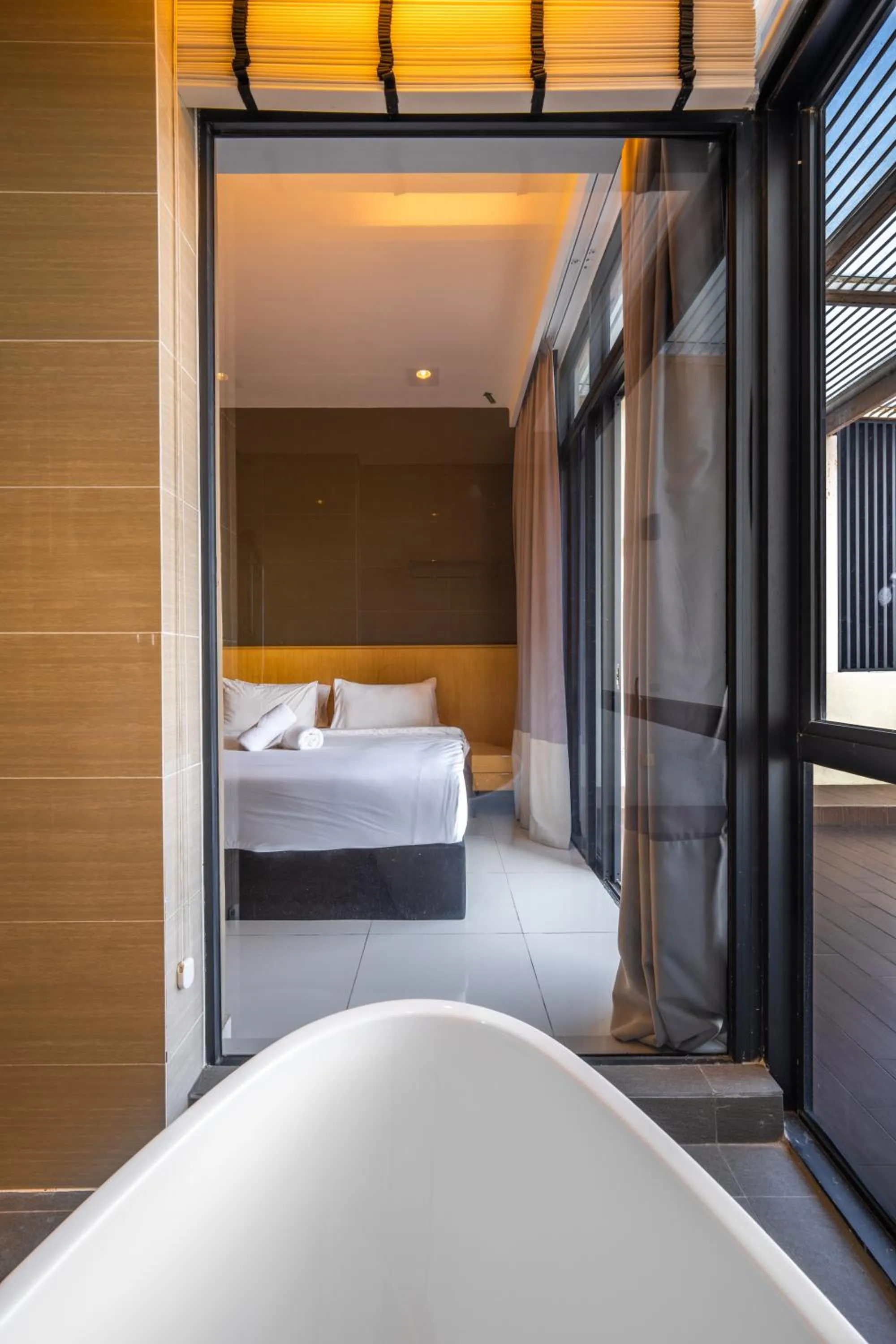 Bed in Greystone 99 Suites