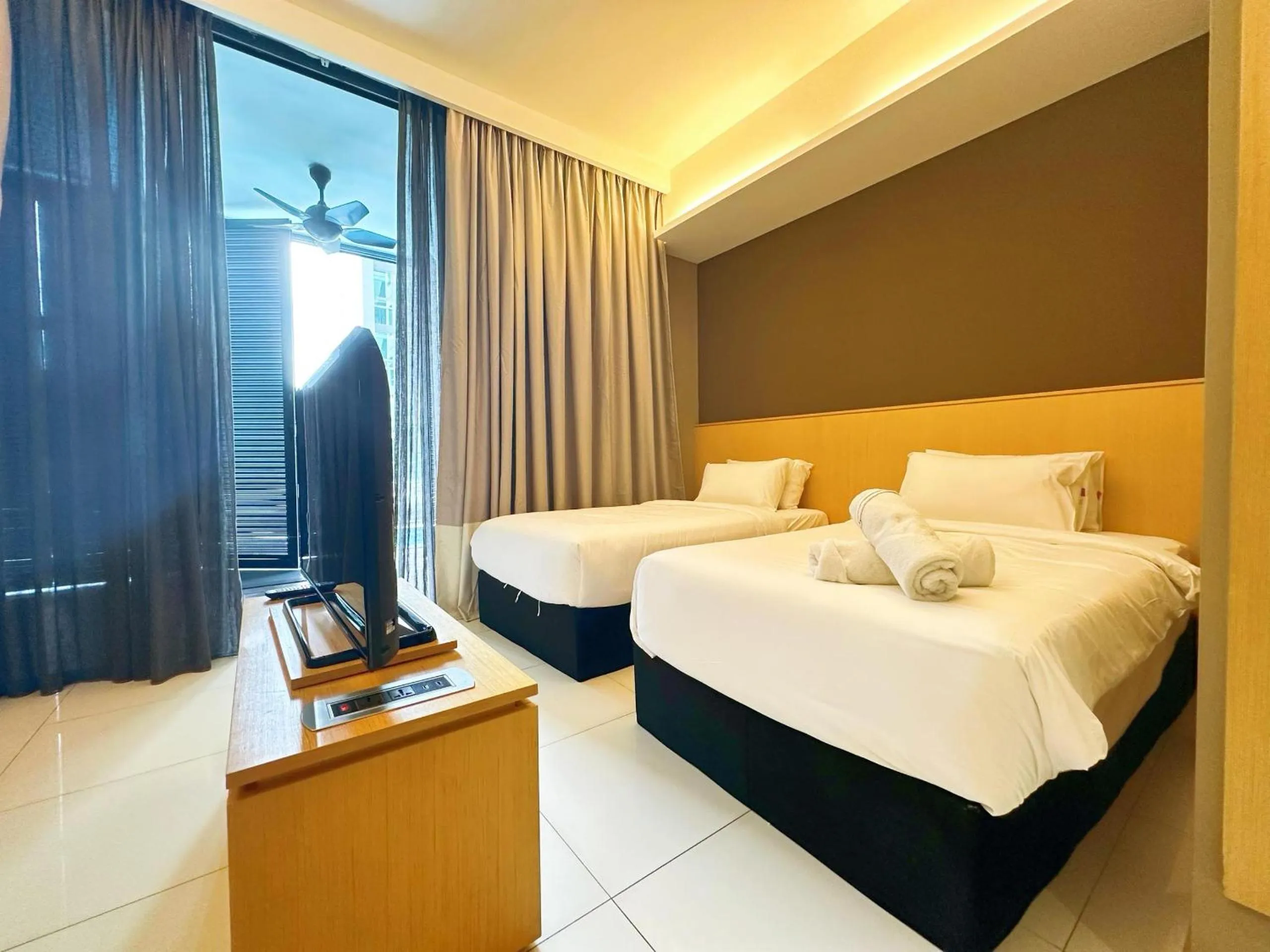 Bed in Greystone 99 Suites