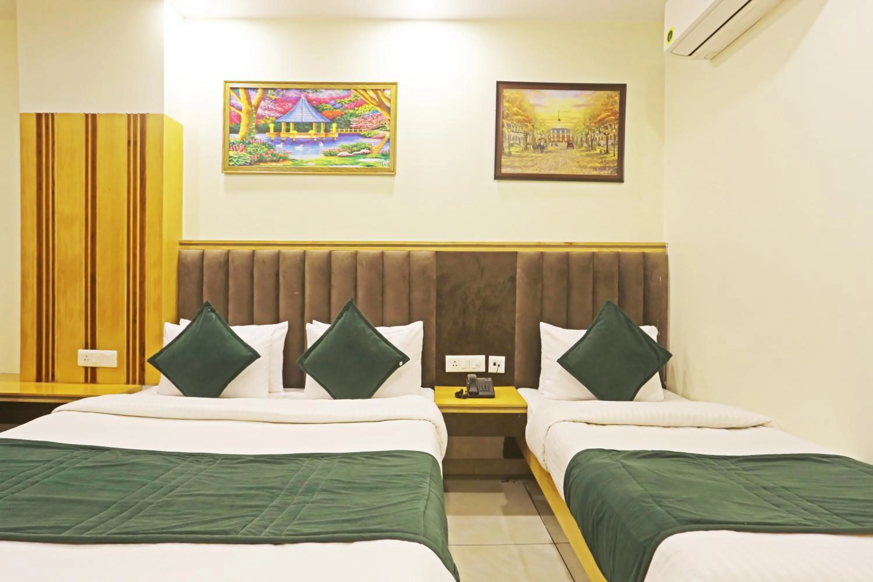 Photo of the whole room, Bed in Hotel Aman Imperial Just a Minute Away From New Delhi Railway Station and Connaught place