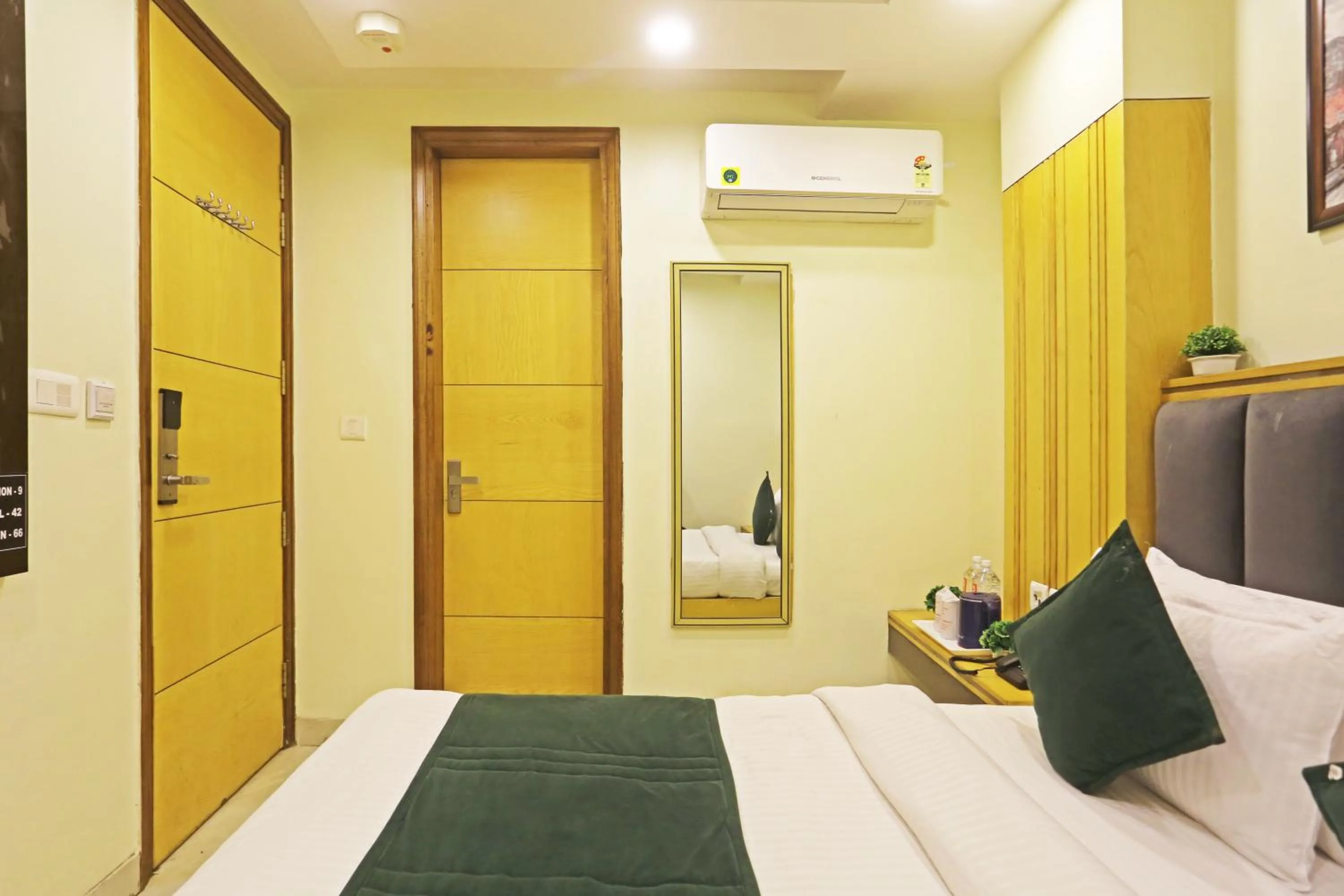Photo of the whole room, Bed in Hotel Aman Imperial Just a Minute Away From New Delhi Railway Station and Connaught place