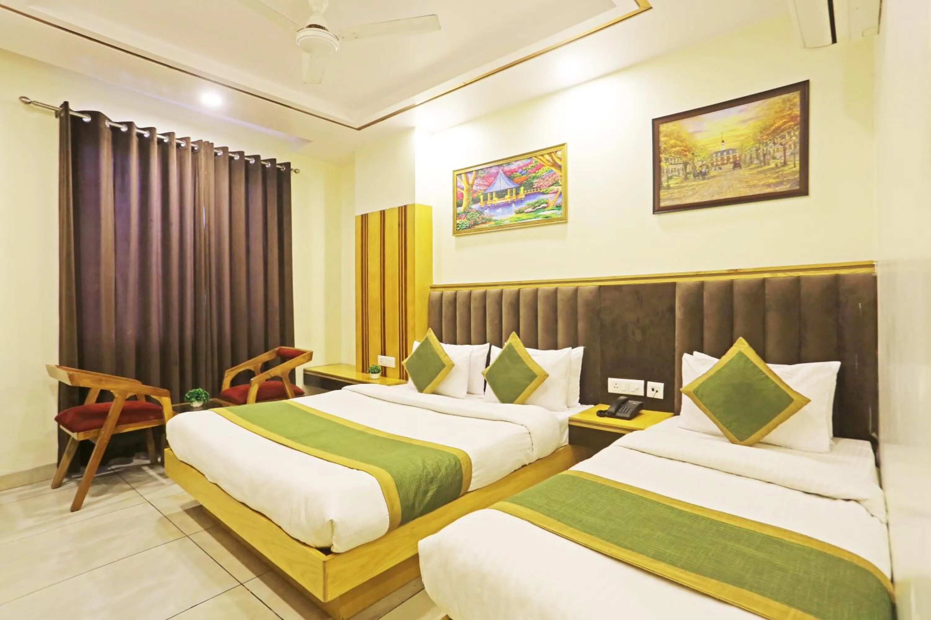 Photo of the whole room, Bed in Hotel Aman Imperial Just a Minute Away From New Delhi Railway Station and Connaught place