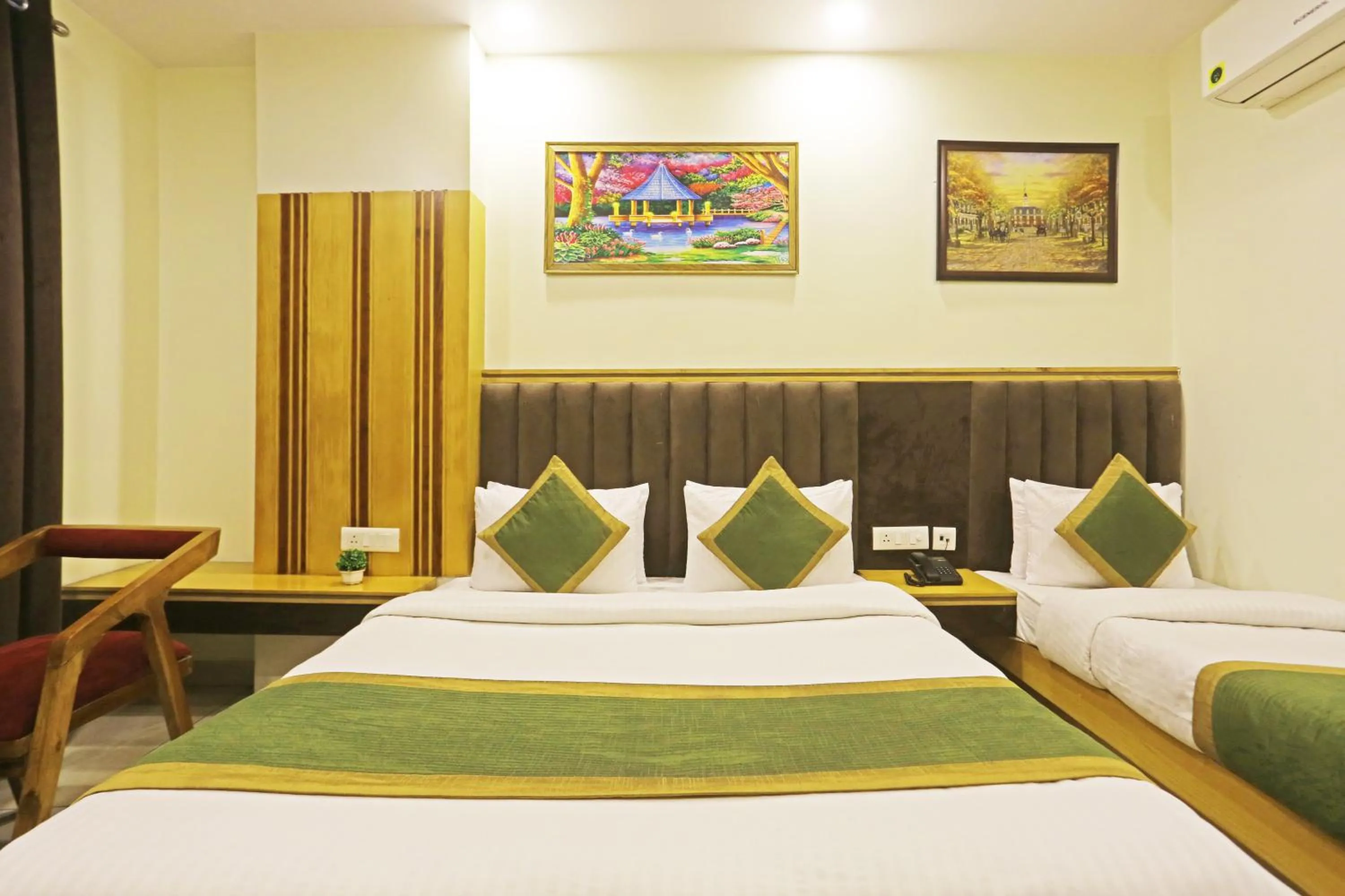 Photo of the whole room, Bed in Hotel Aman Imperial Just a Minute Away From New Delhi Railway Station and Connaught place